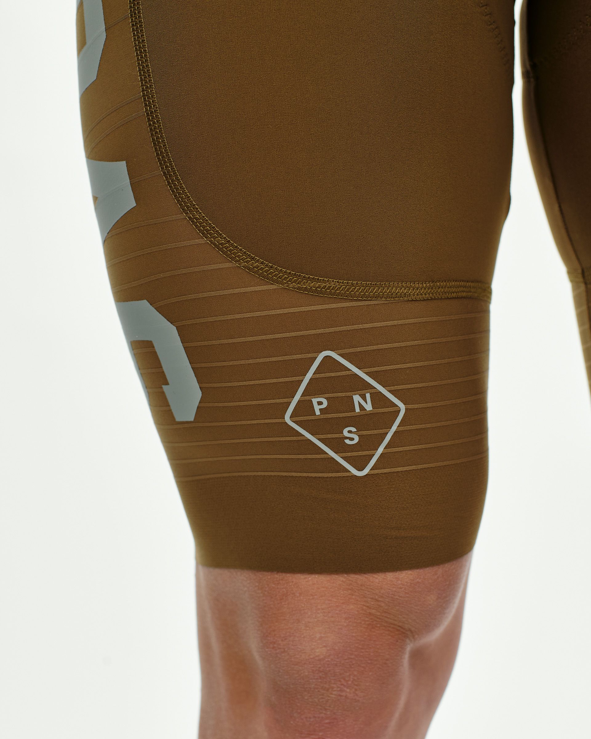 Men's PAS brown shorts with ribbed panels and diamond logo on thigh