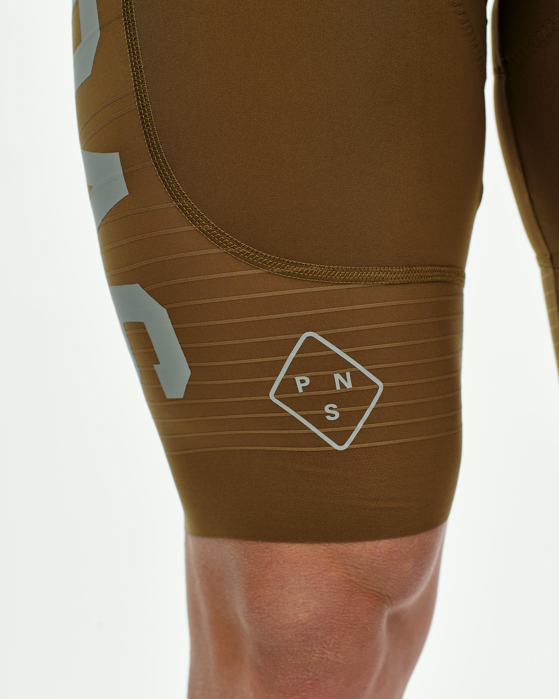 Men's PAS brown shorts with ribbed panels and diamond logo on thigh