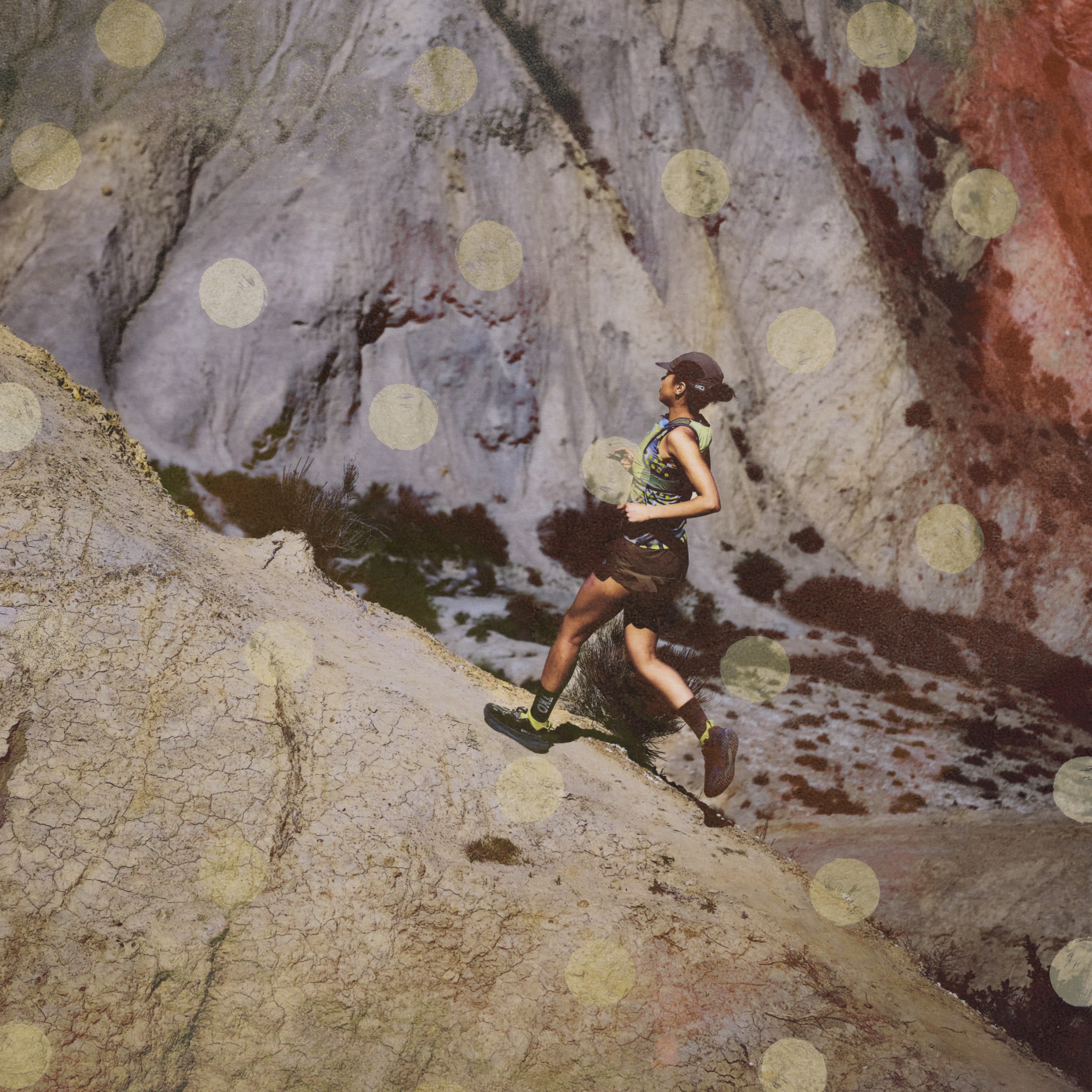 Black T.K.O. Balance shorts on female runner in rocky coastal terrain