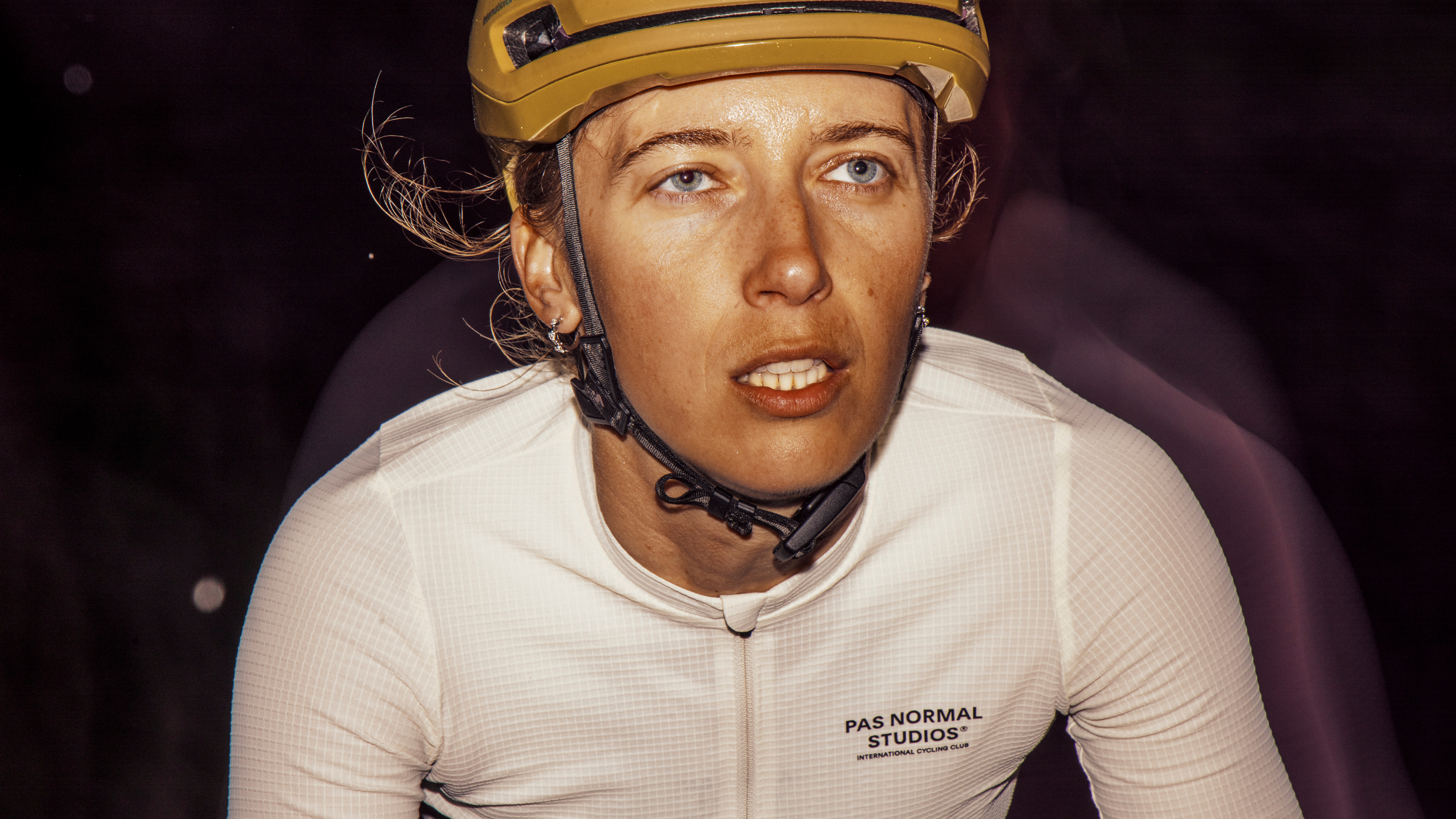 White Mechanism Pro bibs on model with textured fabric and chest logo