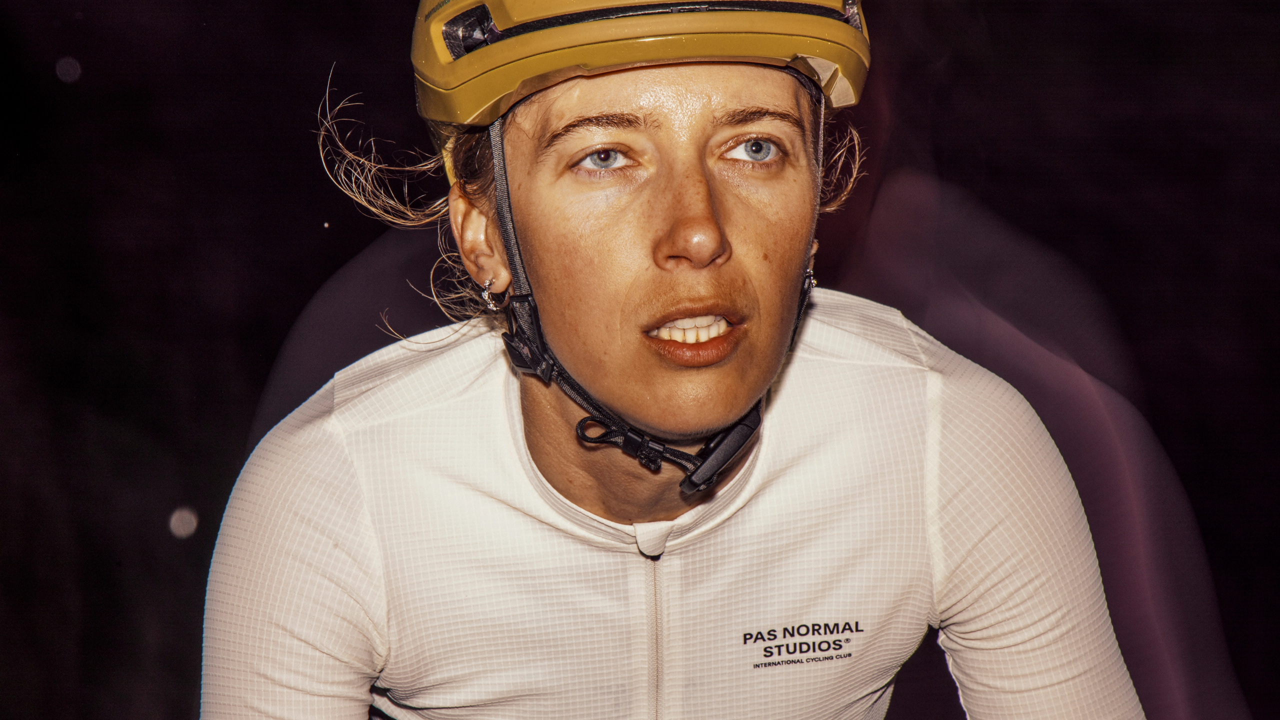 White Mechanism Pro bibs on model with textured fabric and chest logo