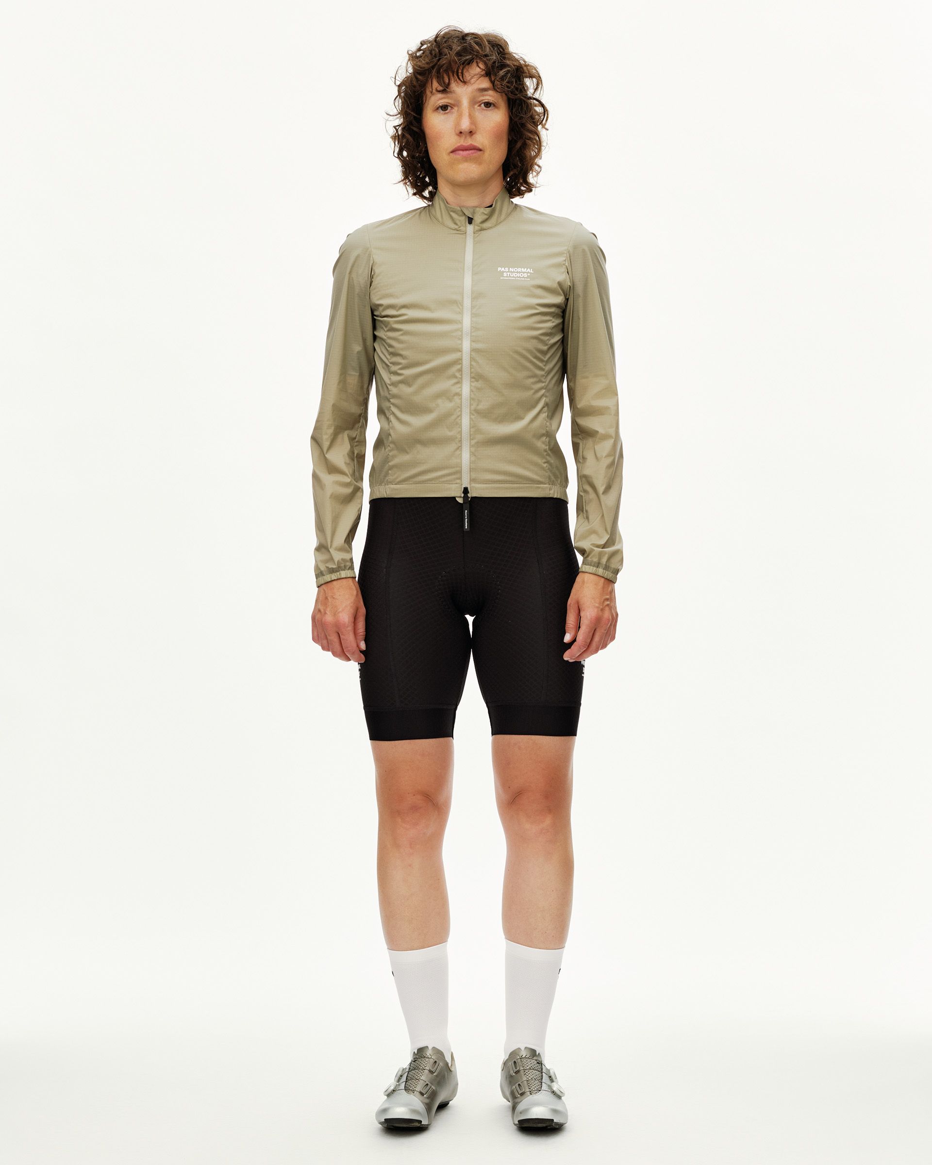 Grey Sage Essential Insulated cycling jacket on model, front view with full zip and white chest logo