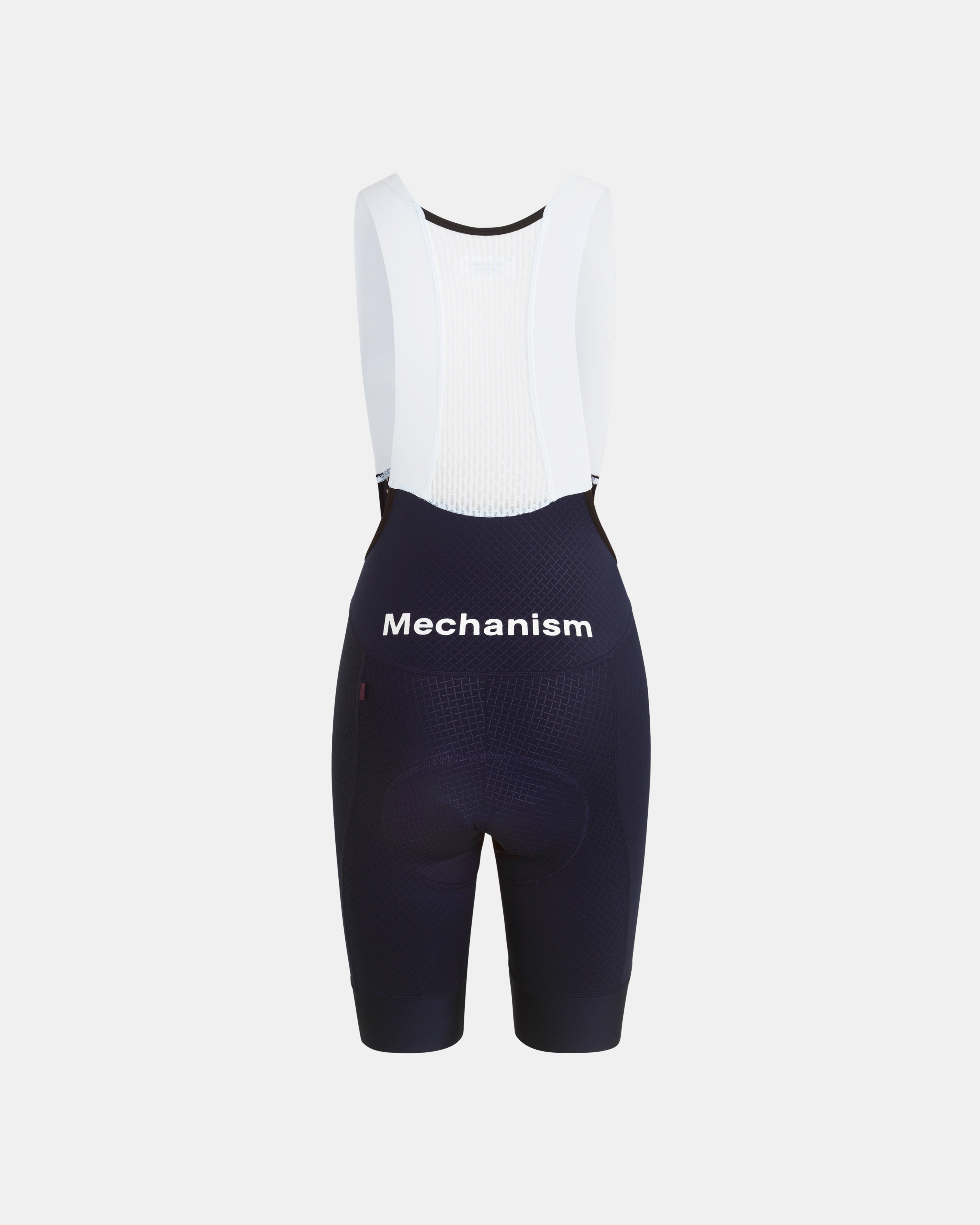 Navy Mechanism cycling bibs, front flat lay with white mesh bib and contrast shoulder straps