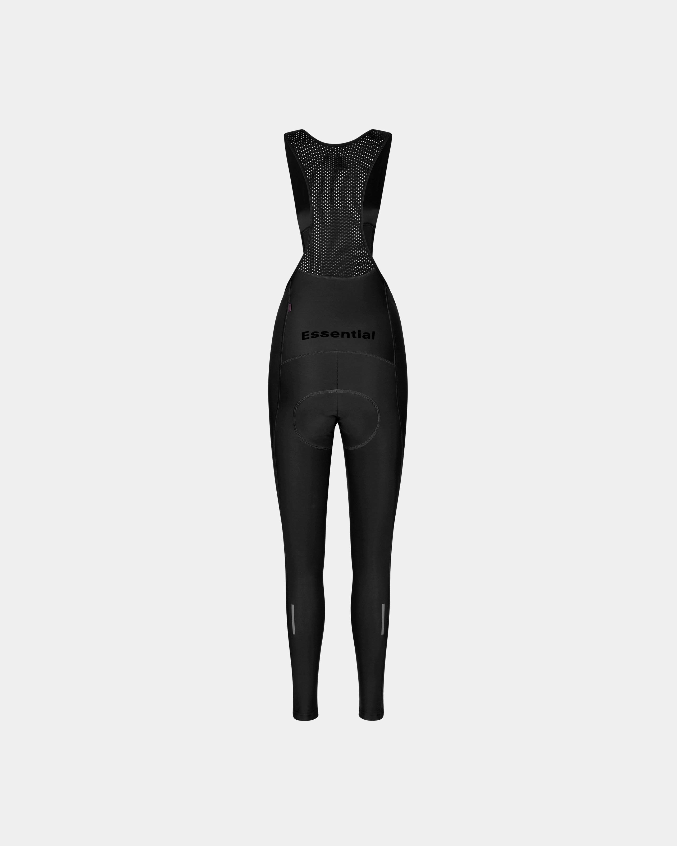 Black Essential women's cycling thermal long bibs, rear view on mannequin with mesh bib panel and reflective ankle strips