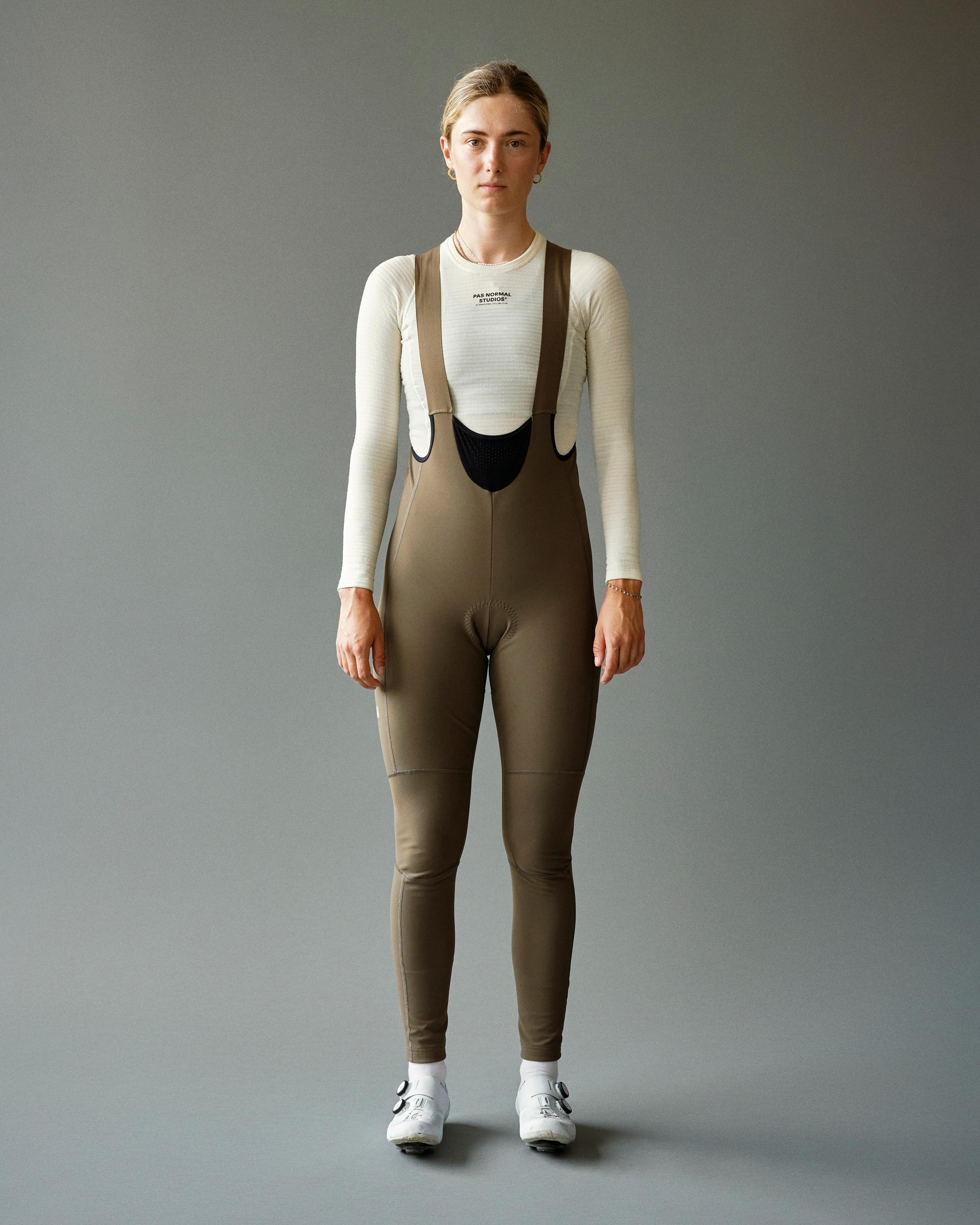 Dark Stone Mechanism Deep Winter Long bibs on model, front view with high bib front and knee panels