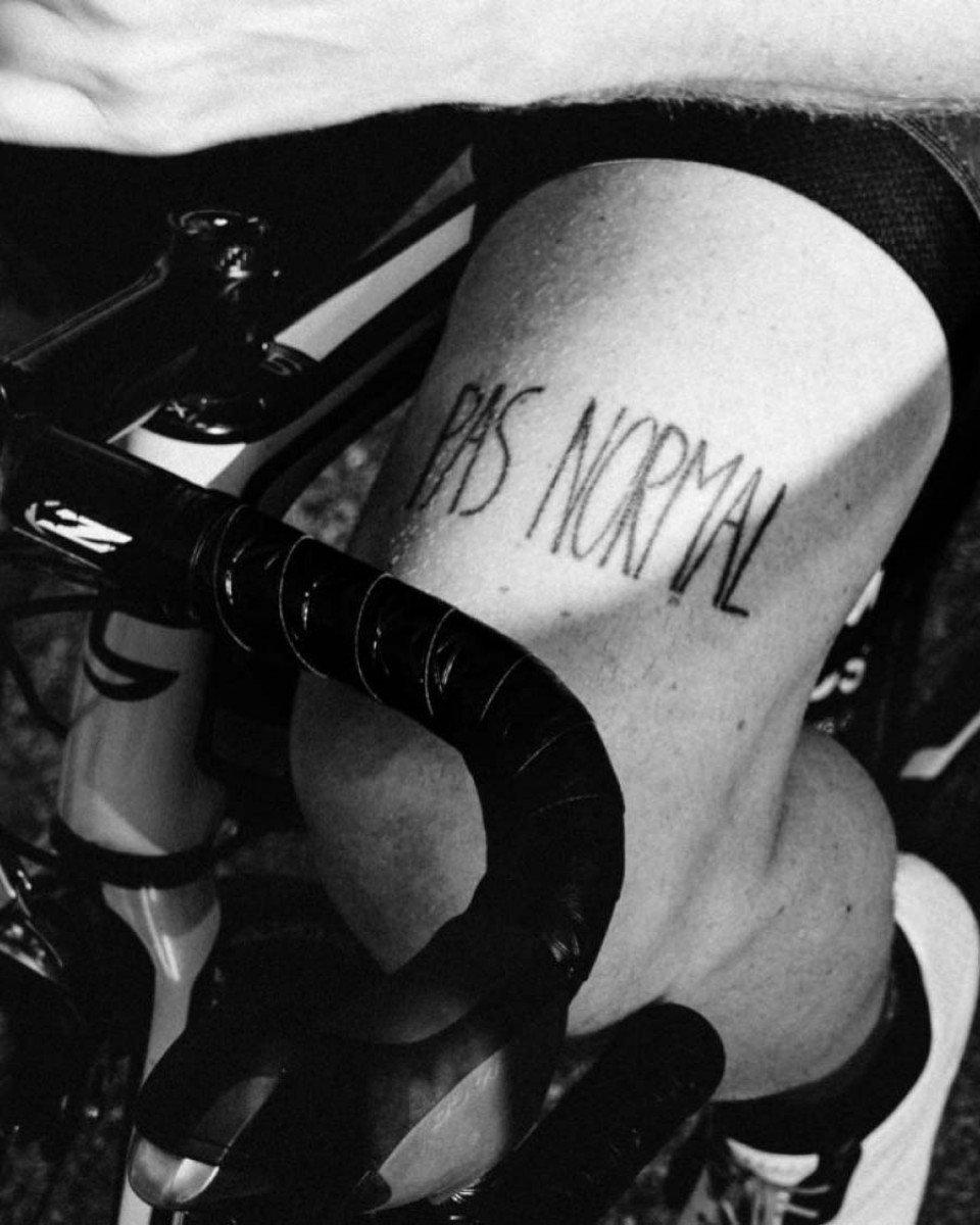 Model wearing PAS cycling shorts with collection branding on thigh, black and white photo
