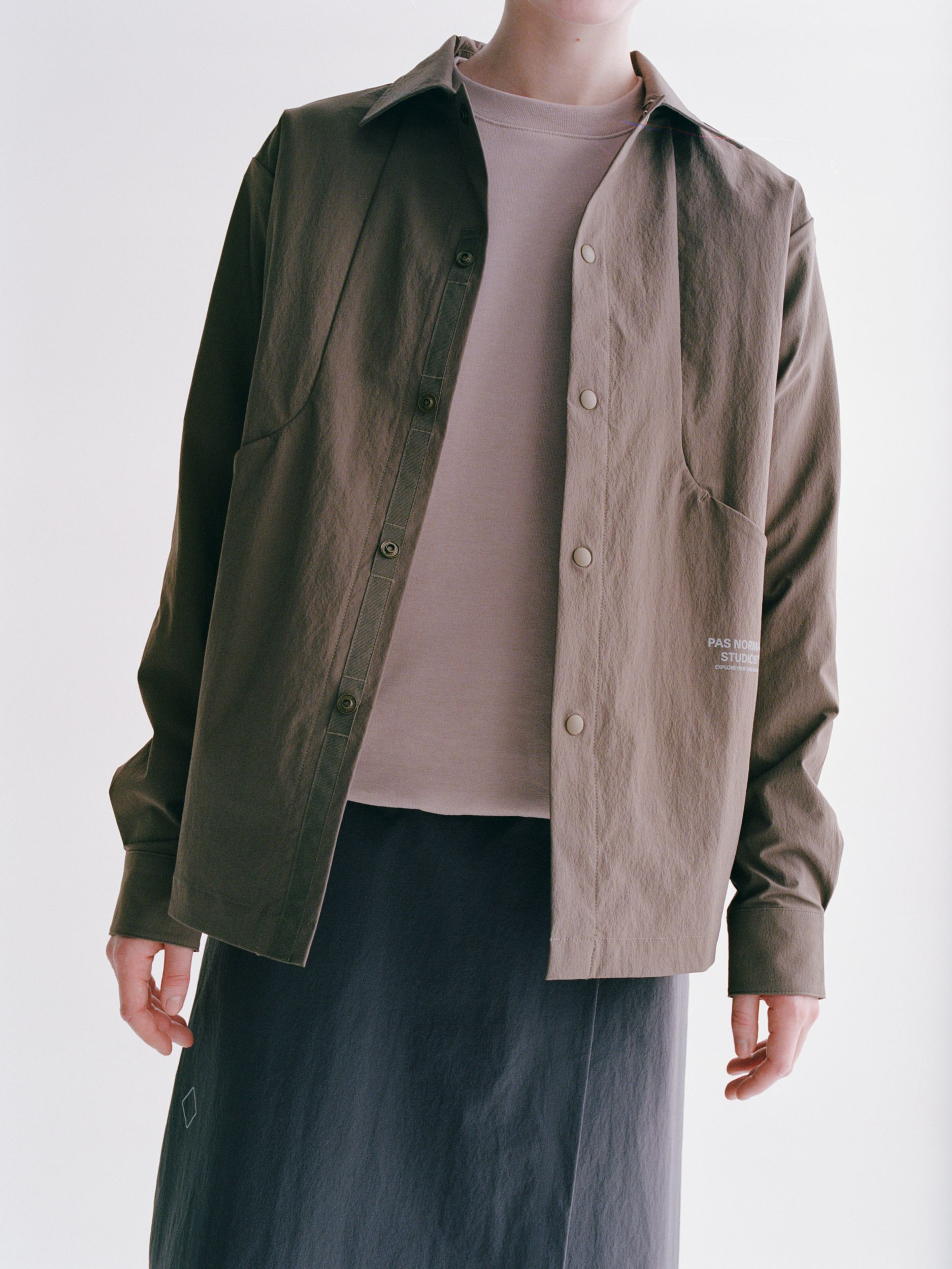 Brown Off-Race Tech Overshirt on model, front view with contrast green and brown panels