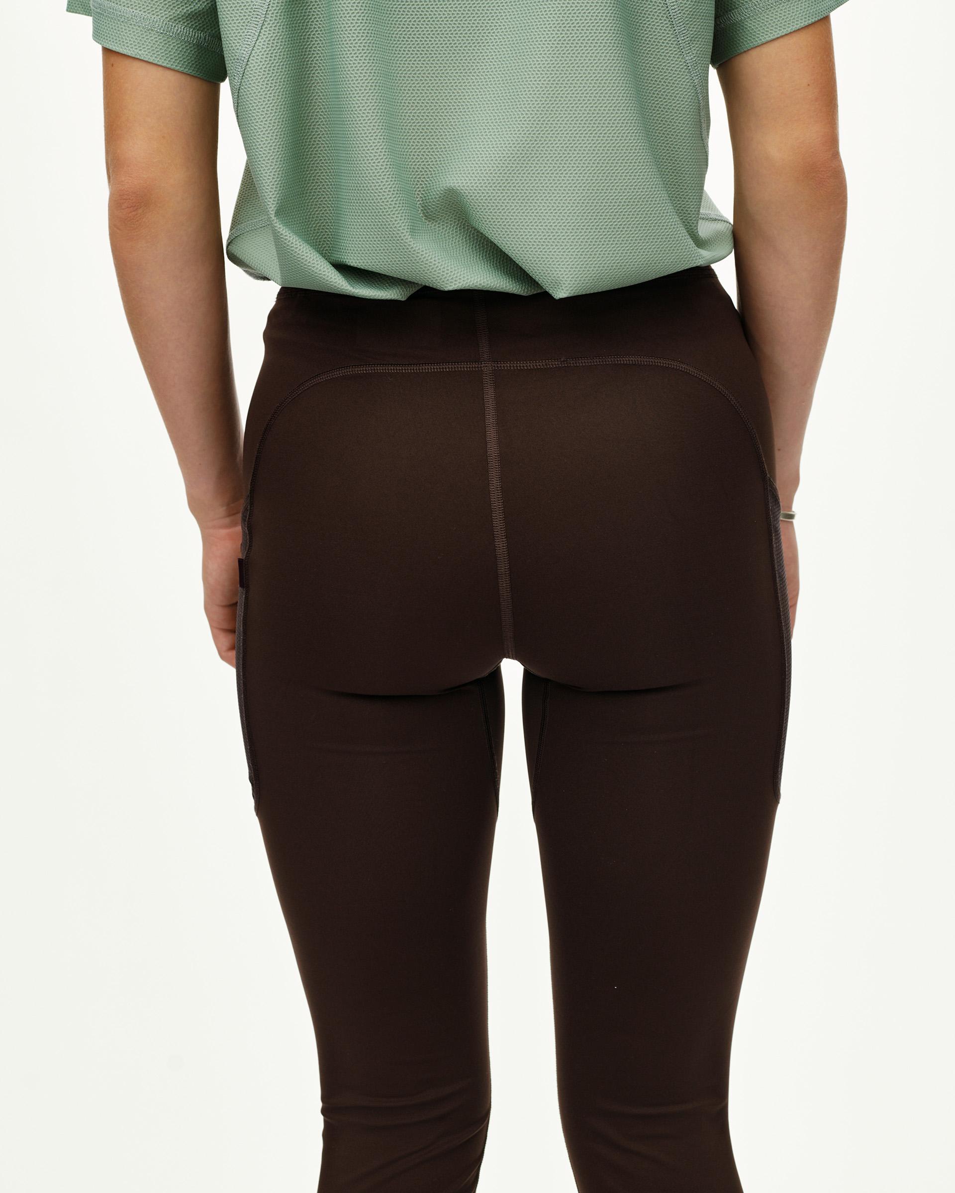 Dark Coffee Balance women's long cycling tights on model, rear view with contrast side panels
