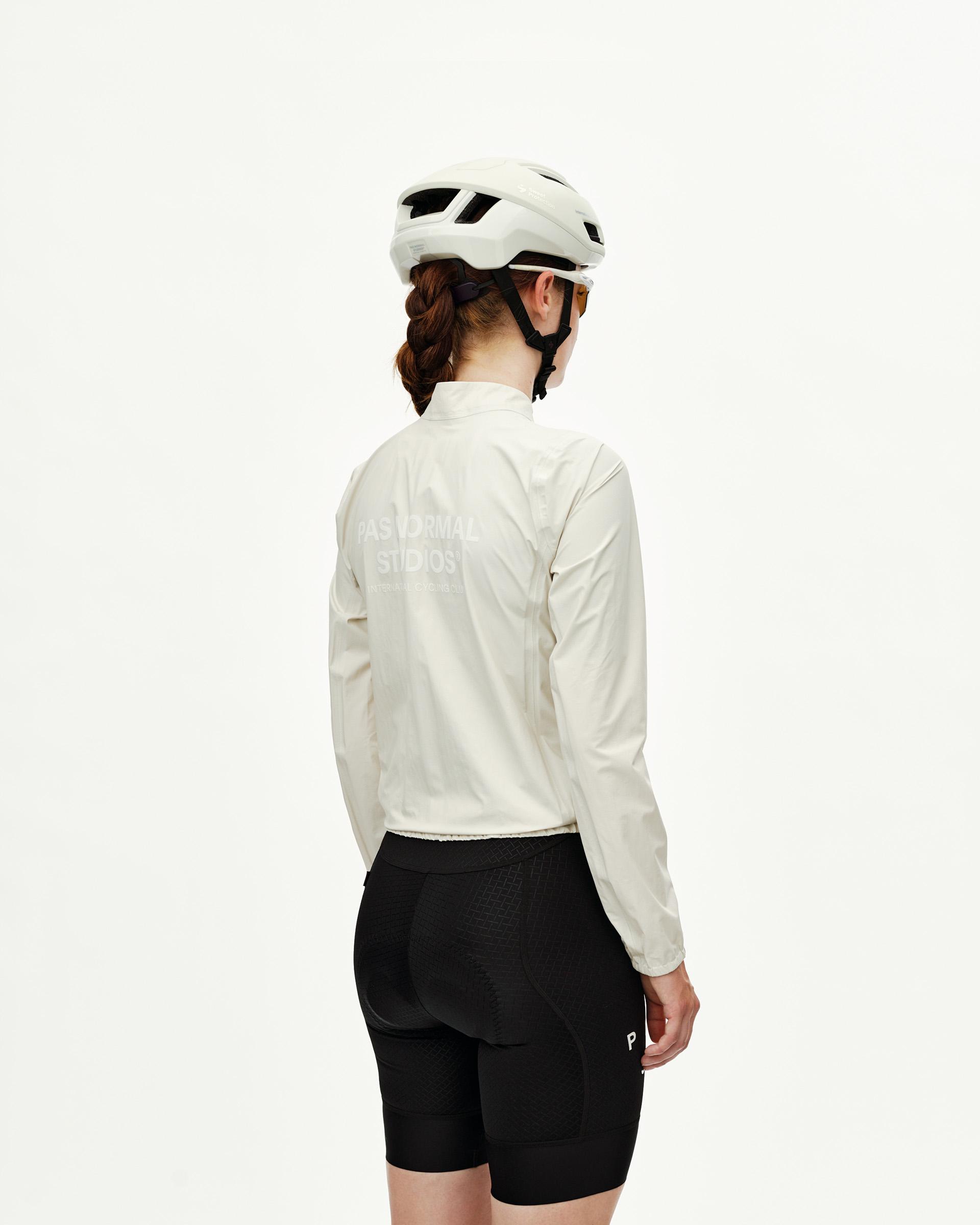Off White Mechanism cycling rain jacket on model, rear view with tonal back print