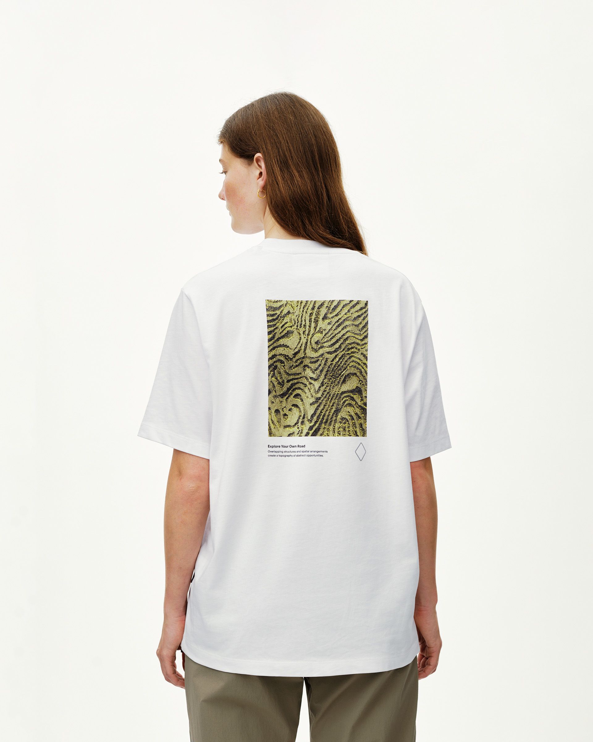 White Off-Race Graphic T-shirt, rear view on model with abstract terrain print on back