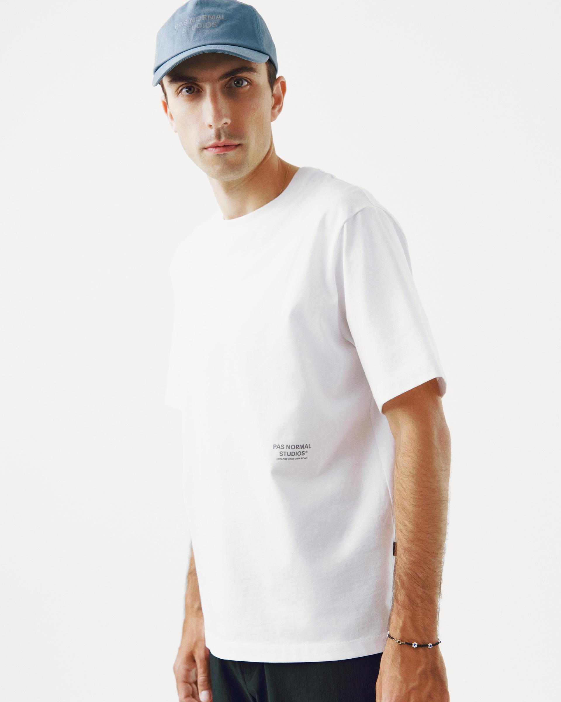 White Off-Race Graphic t-shirt on model with grey chest logo
