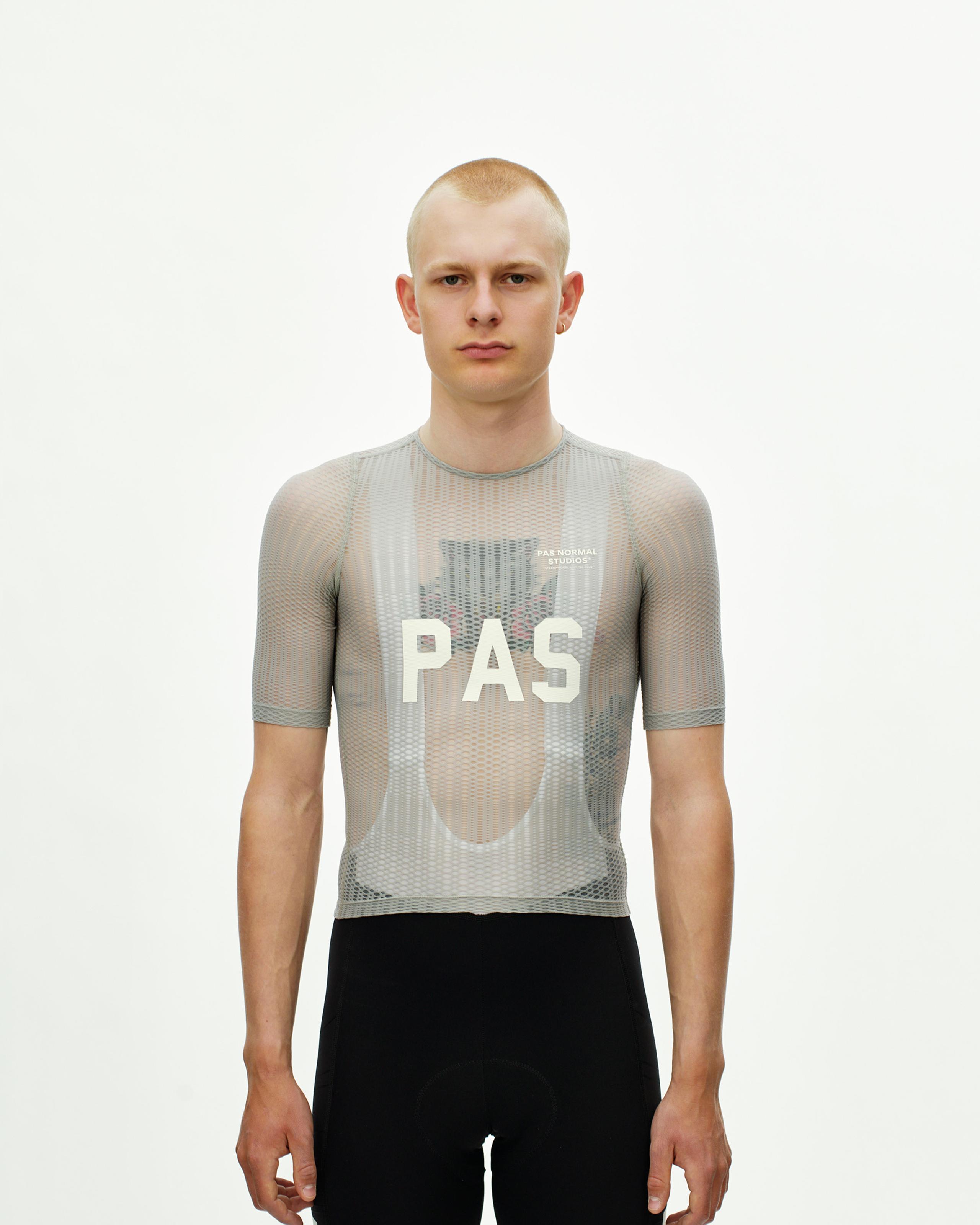 Light Grey PAS Mechanism Pro Zipless cycling jersey on model with mesh construction and white chest print