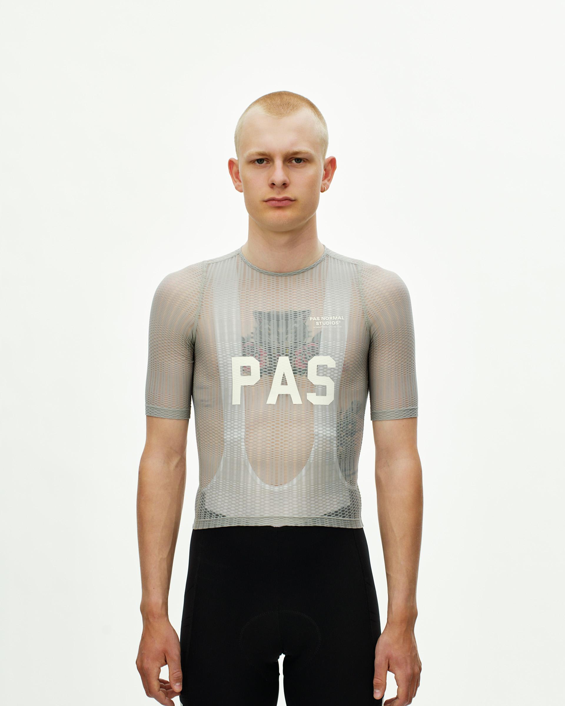 Light Grey PAS Mechanism Pro Zipless cycling jersey on model with mesh construction and white chest print