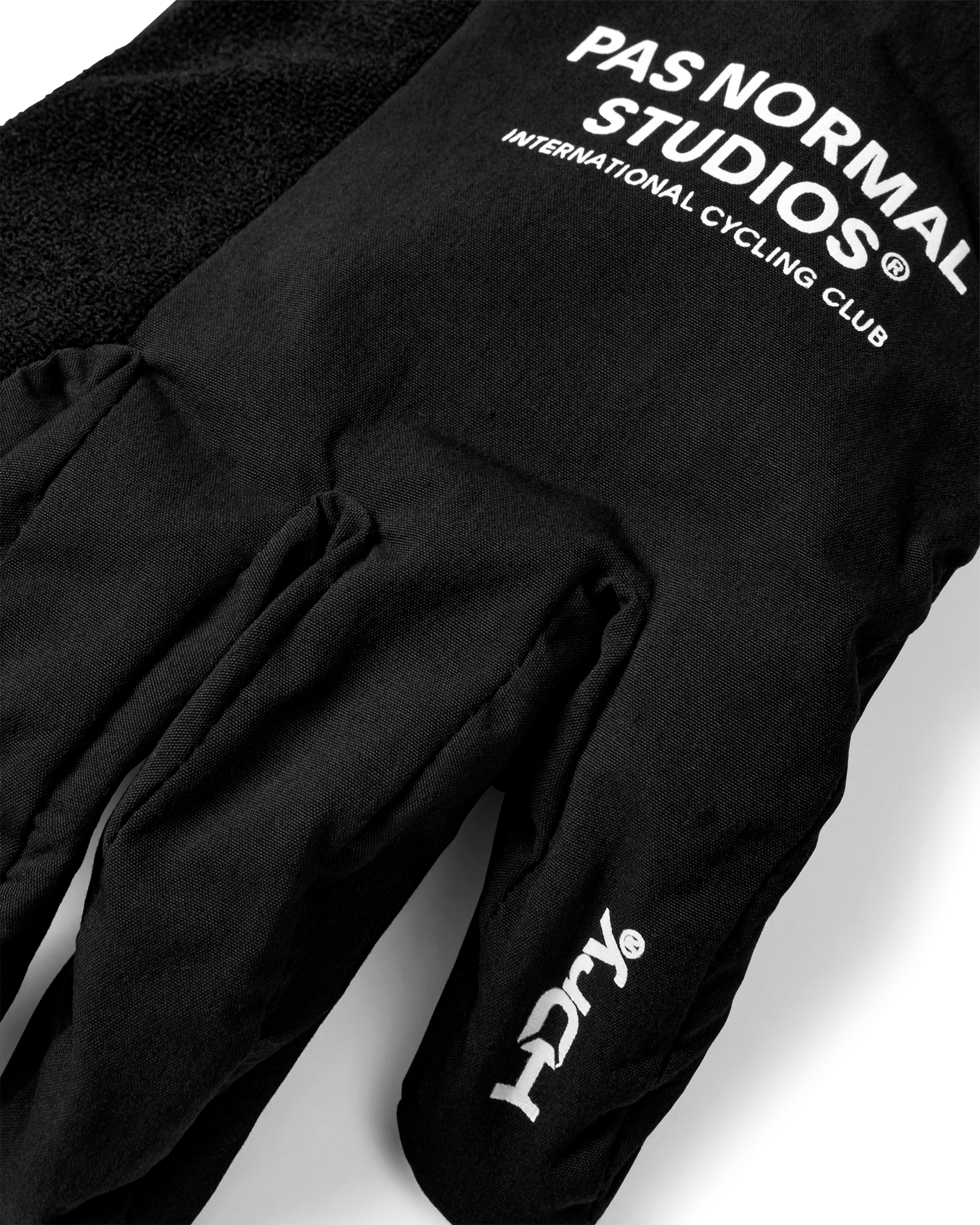 Black Logo Mid cycling glove, detail view showing white chest print and HDry logo on back of hand