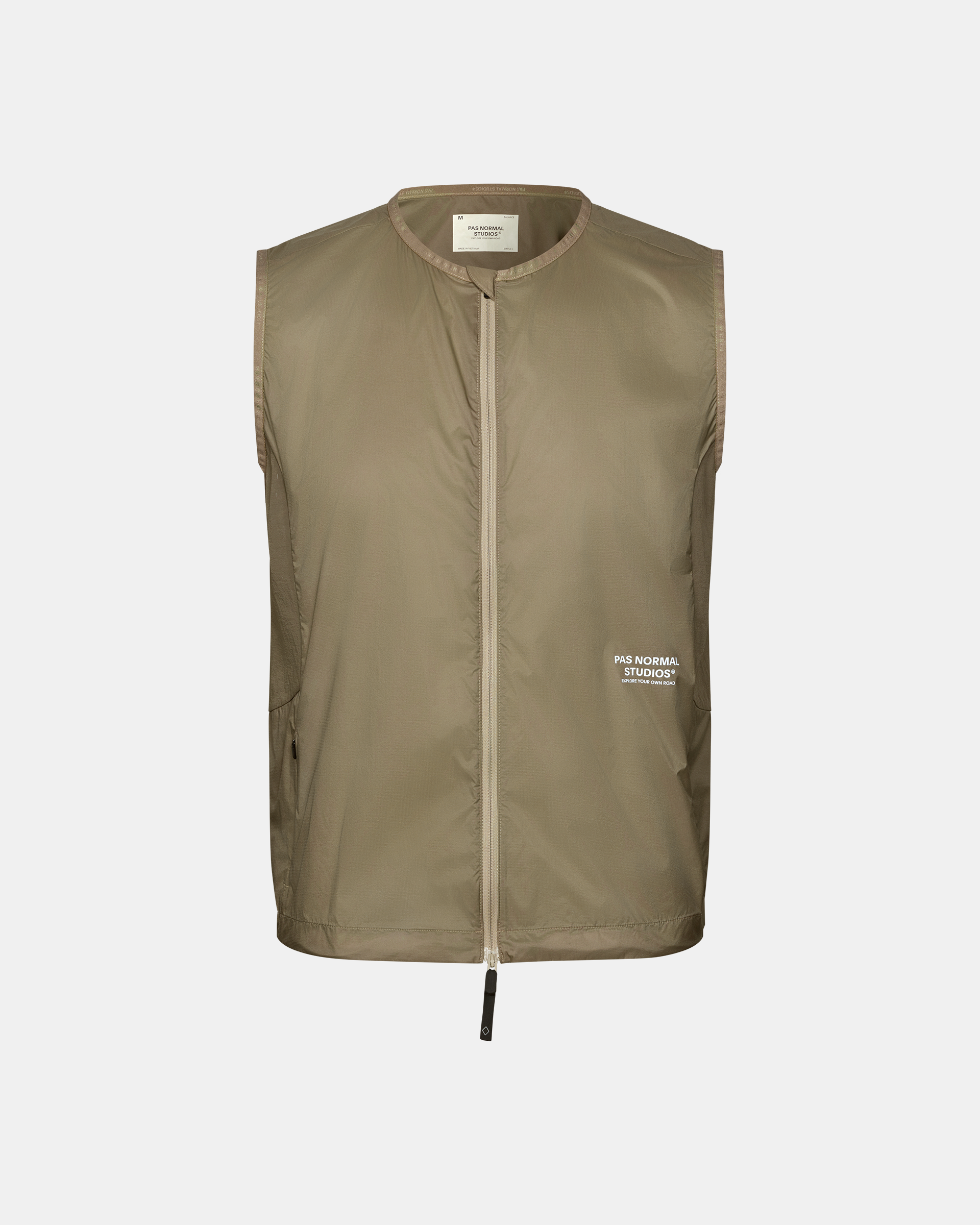 Dusty Earth khaki Balance Windproof cycling vest, front flat lay with full zip and white chest print