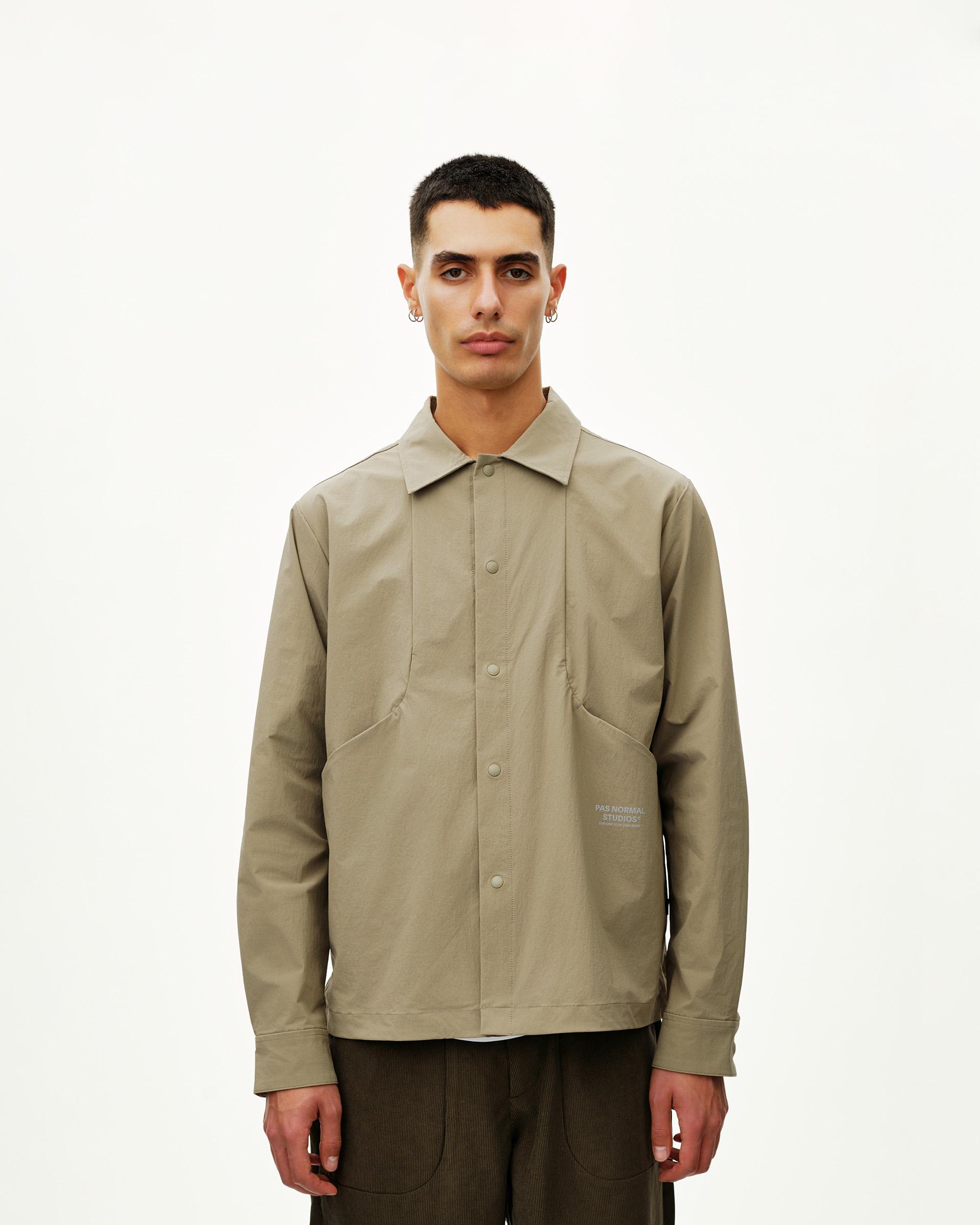 Dusty Earth khaki Off-Race Tech Overshirt on model, front view with snap button placket