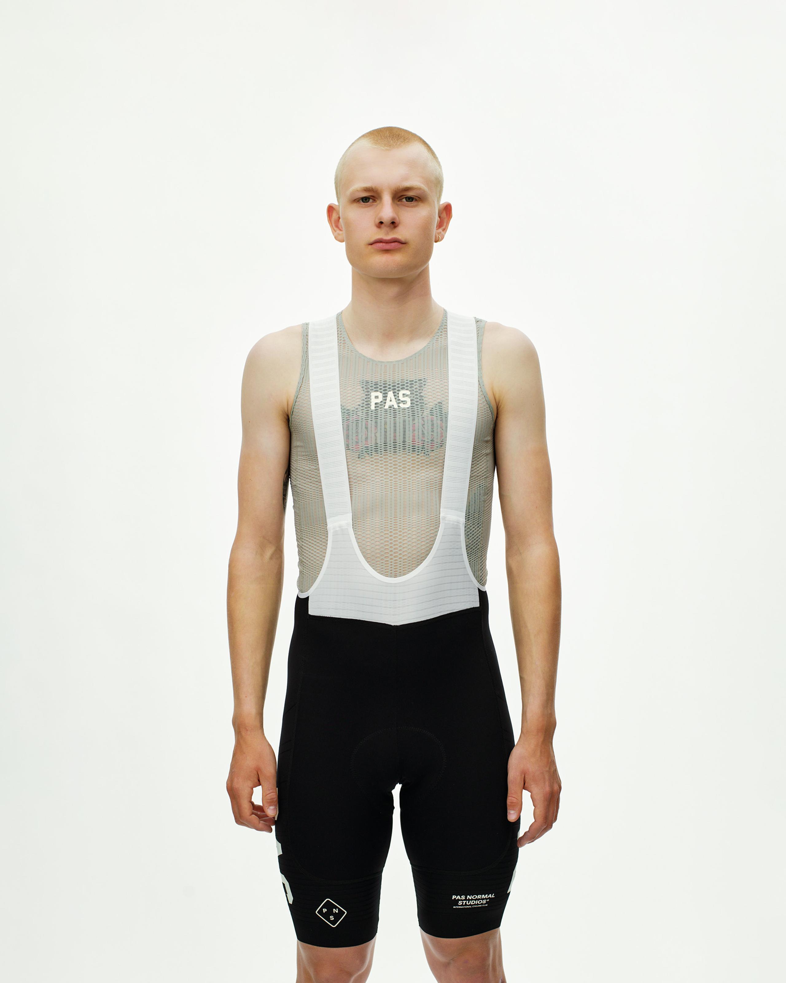 Black PAS Mechanism Pro cycling bibs on model with white mesh bib straps