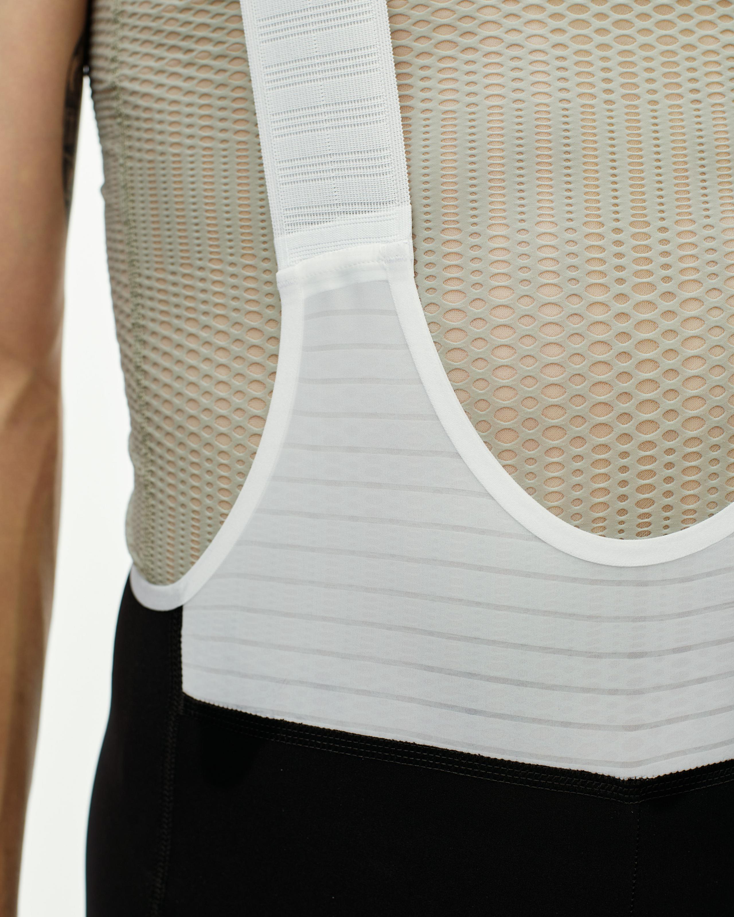Black PAS Mechanism Pro bibs, side detail view showing mesh back panel and ribbed waistband