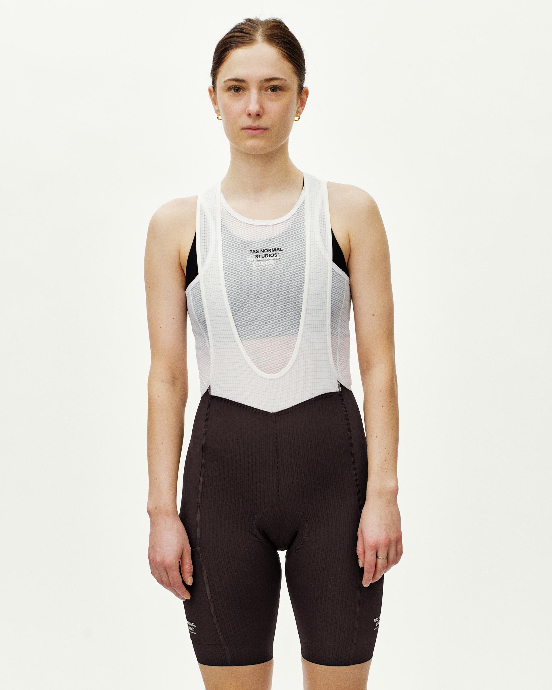 Dark Purple Essential Light Cargo cycling bibs on model with white mesh bib panel