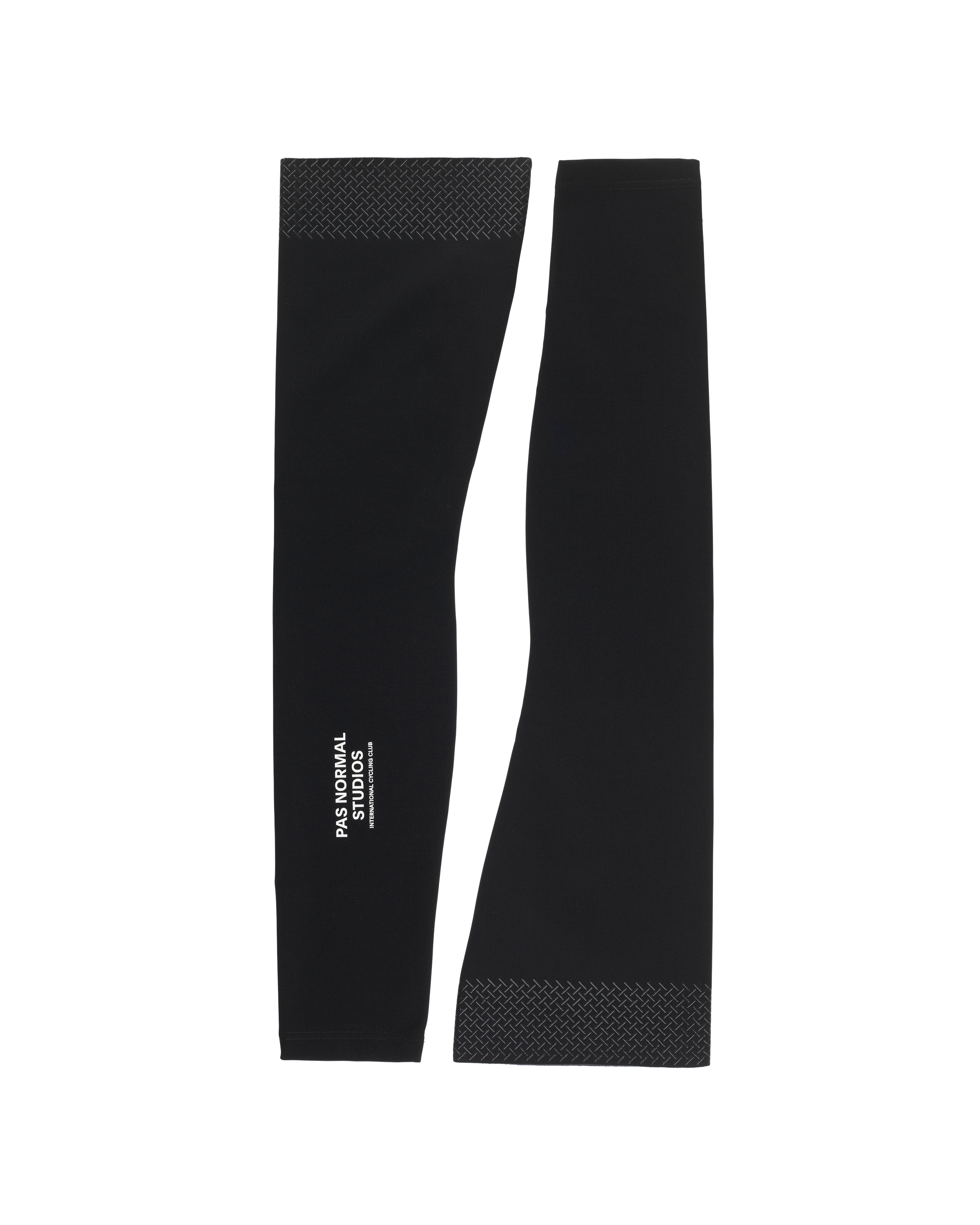 Black Logo leg warmers, flat lay pair with textured cuffs and white branding