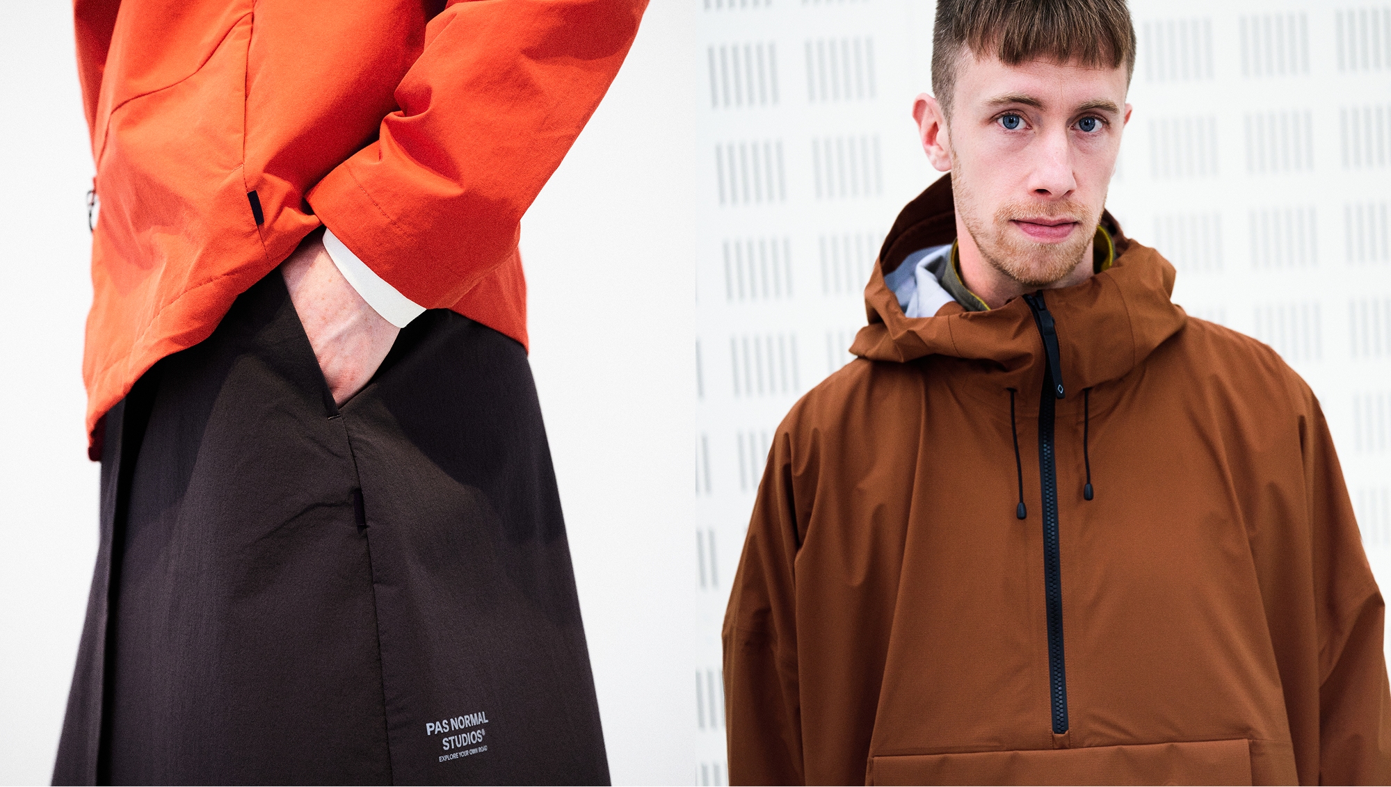 Model wearing orange jacket and brown hooded pullover with black shorts in studio setting