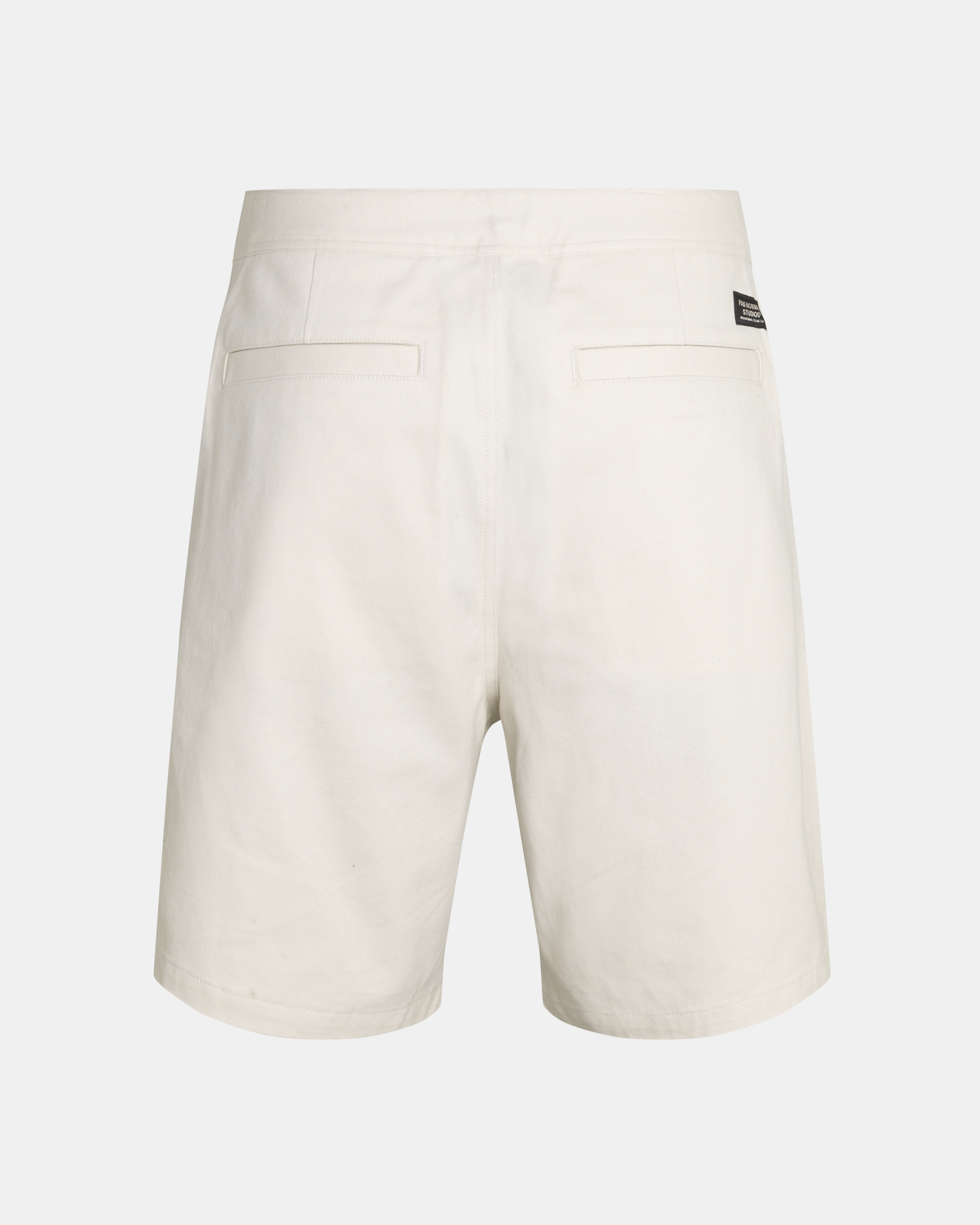 Limestone Off-Race Cotton Twill shorts, rear flat lay with back pockets and black label