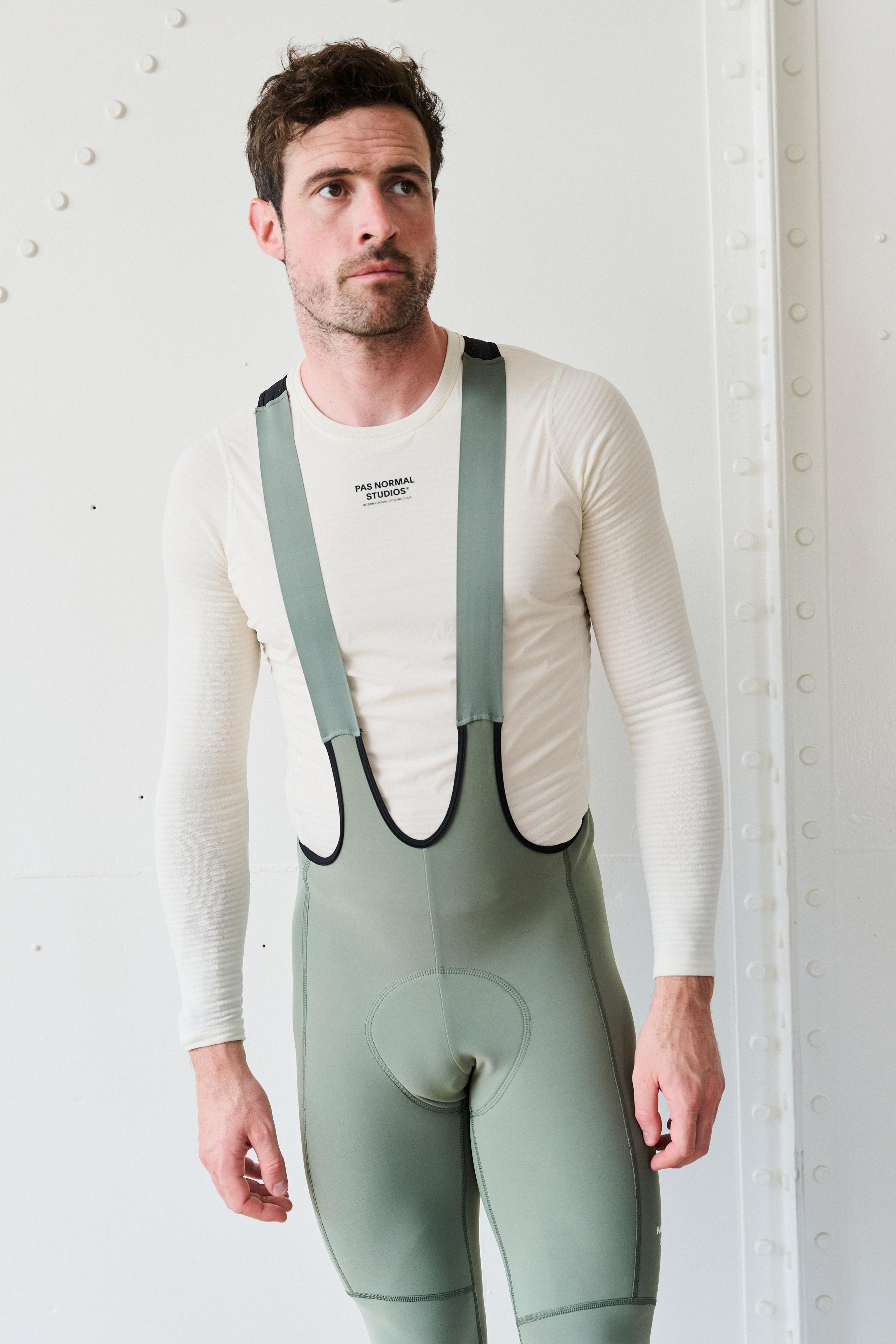Off White Thermal Windproof base layer on model with textured sleeves and chest logo