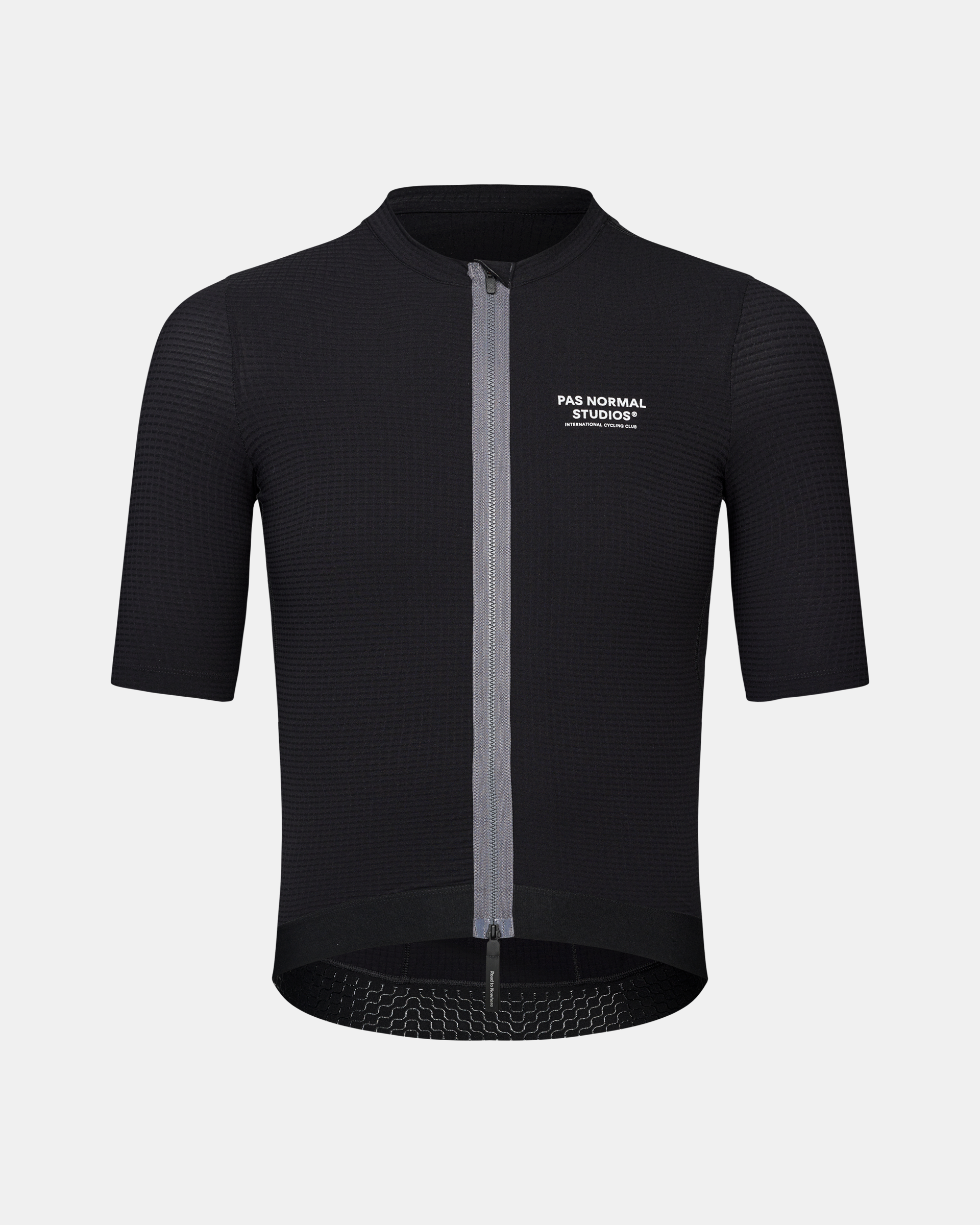 Black Escapism cycling jersey, front view with textured fabric and white chest logo