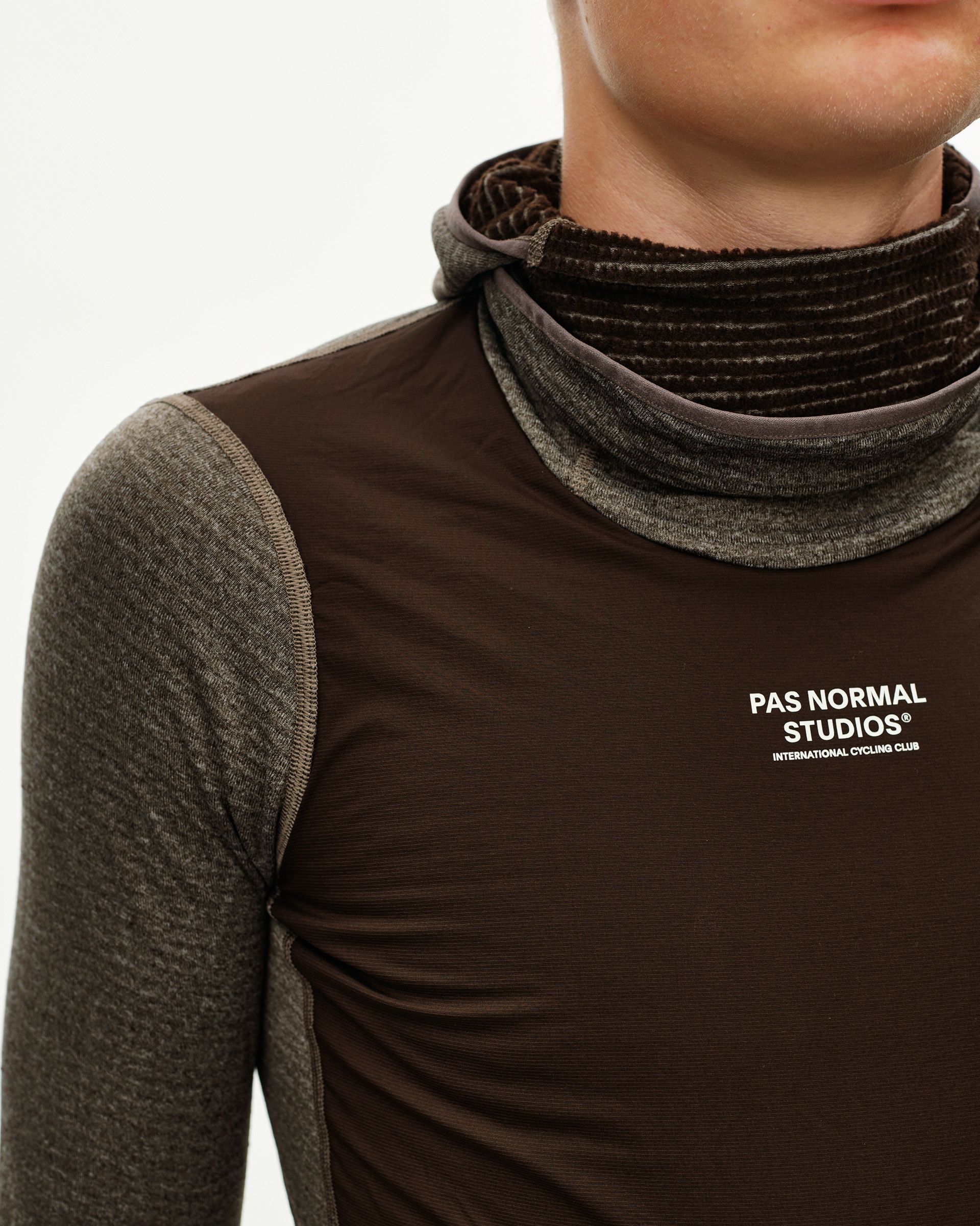 Dark Coffee brown Thermal Hooded Windproof cycling base layer, front detail with ribbed neck gaiter and chest logo print