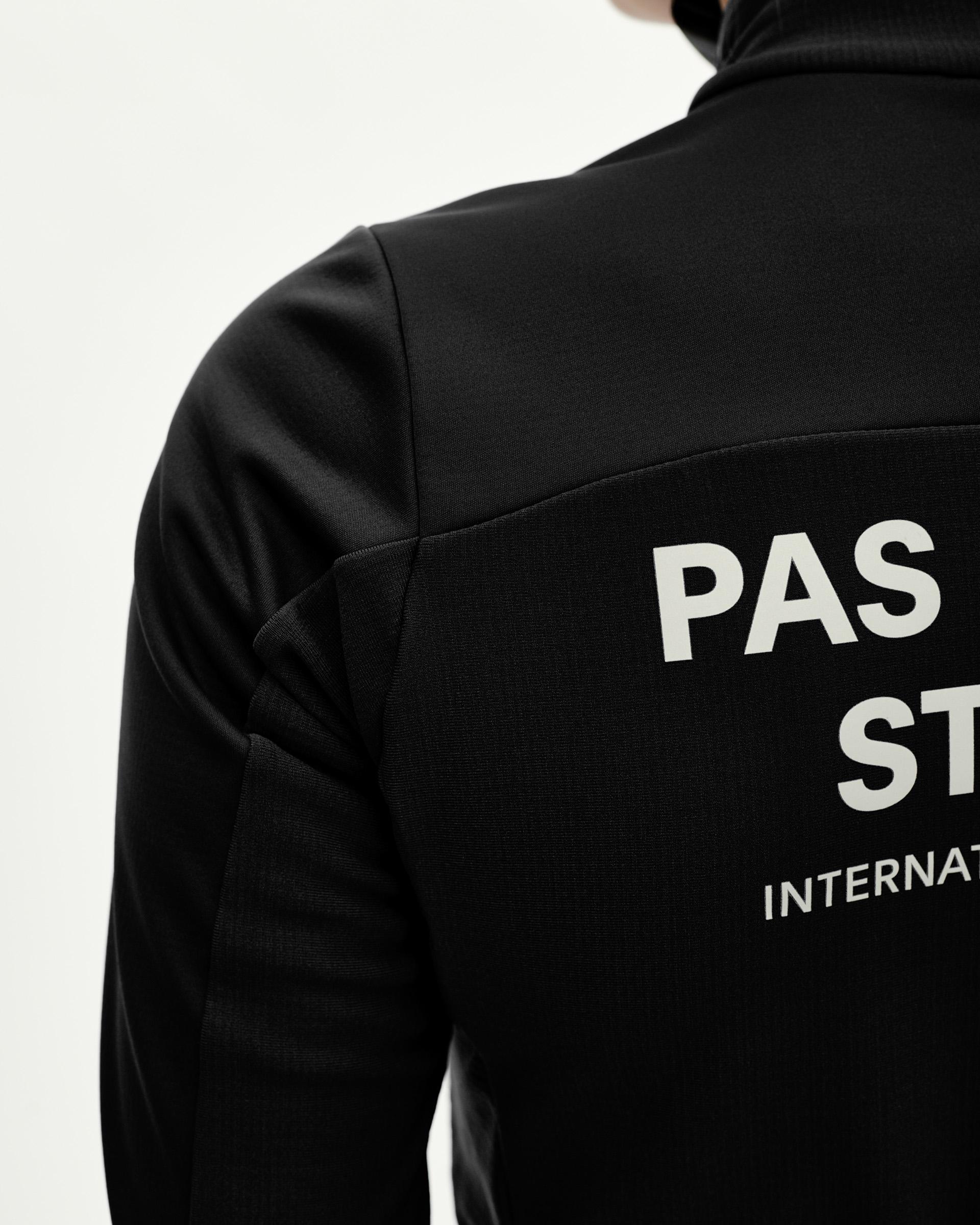 Black Mechanism Thermal Long Sleeve cycling jersey, rear detail on model with white back print