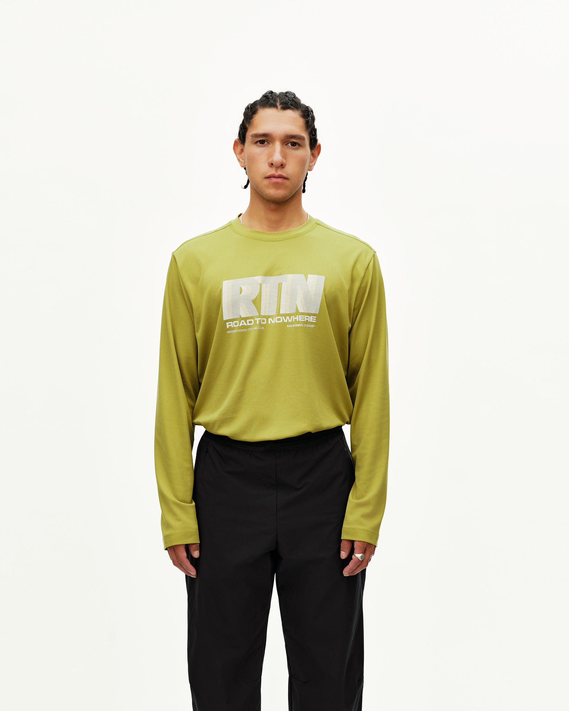 Black Balance Performance pants on model, front view