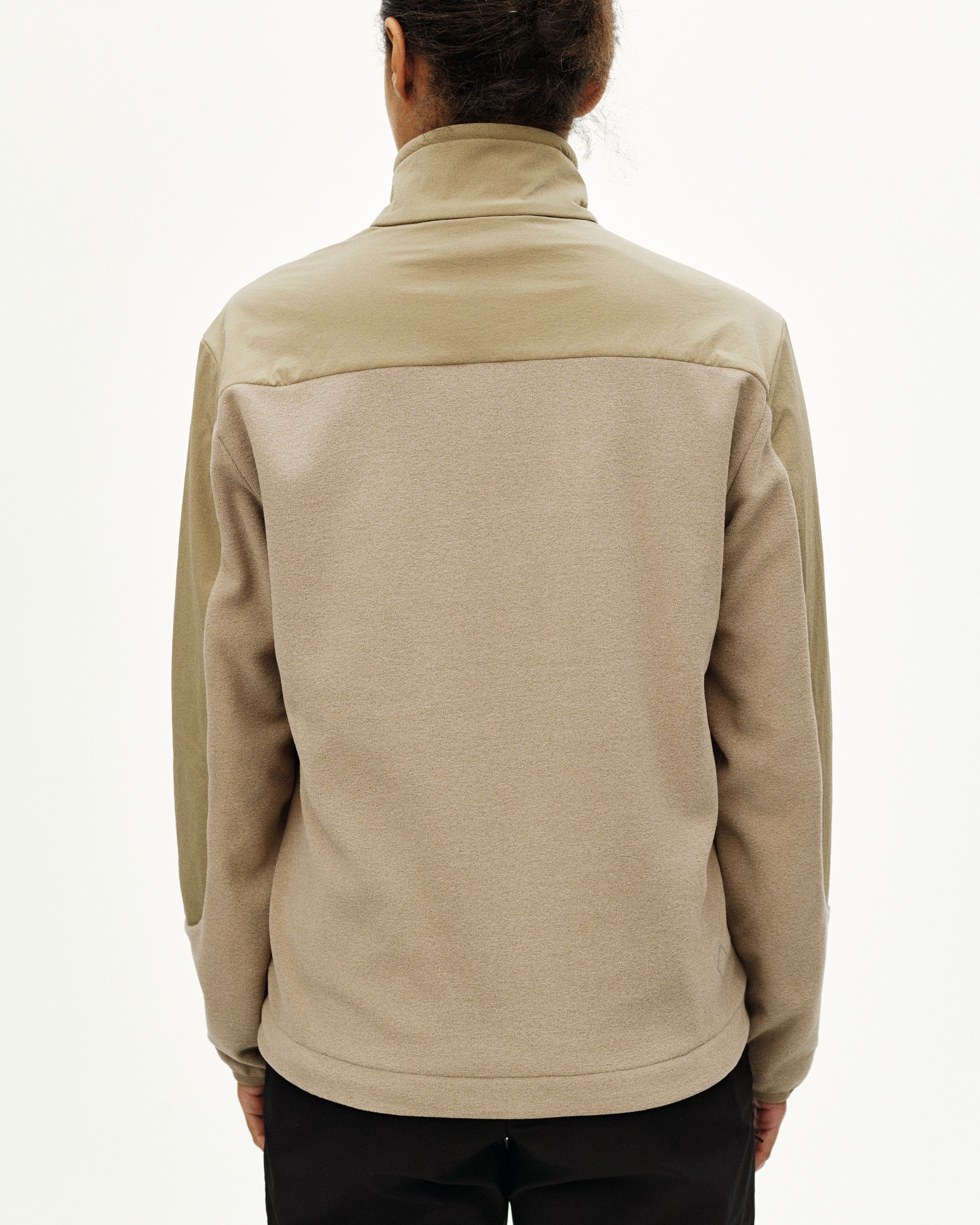 Beige Off-Race Light Fleece half-zip, rear view on model with contrast panel detailing