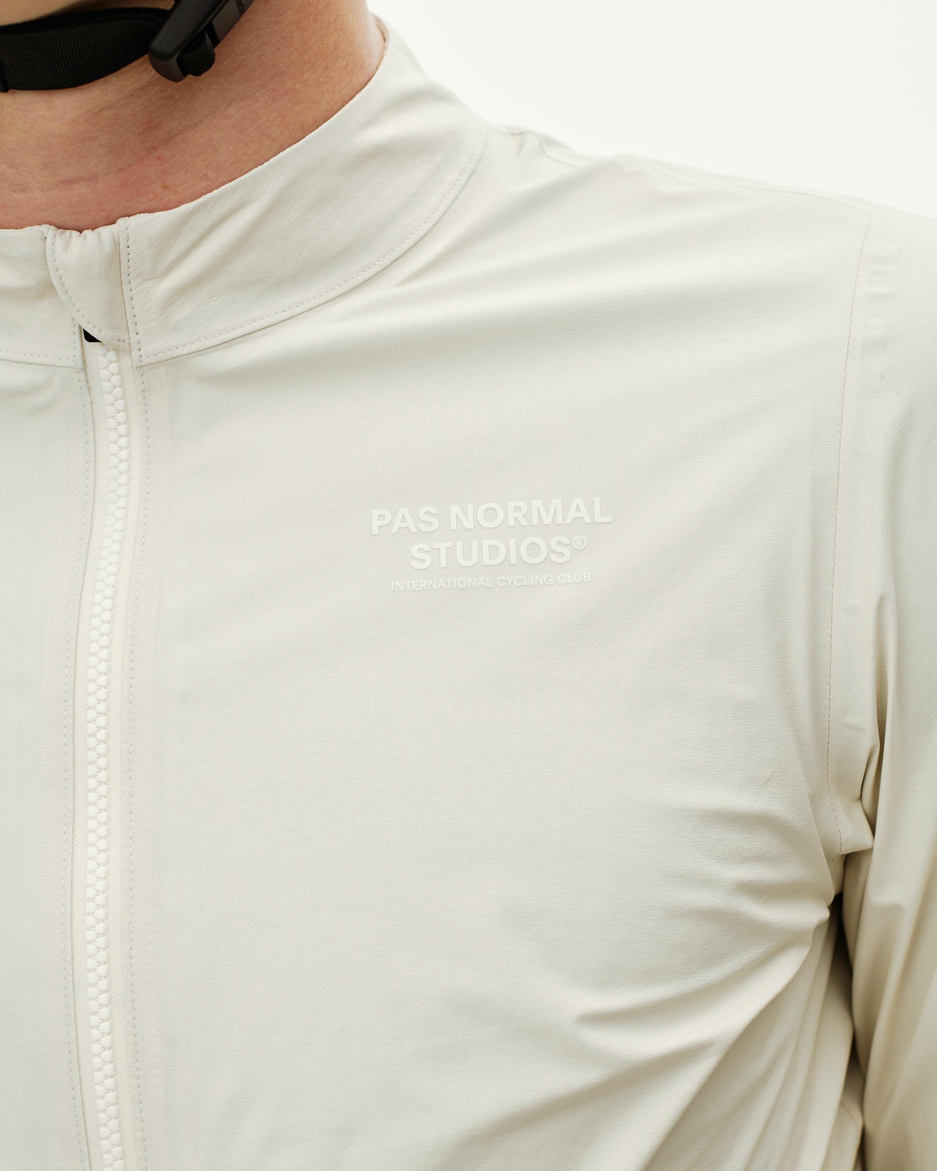 Off White Mechanism Rain cycling jacket, front detail on model with tonal chest logo print