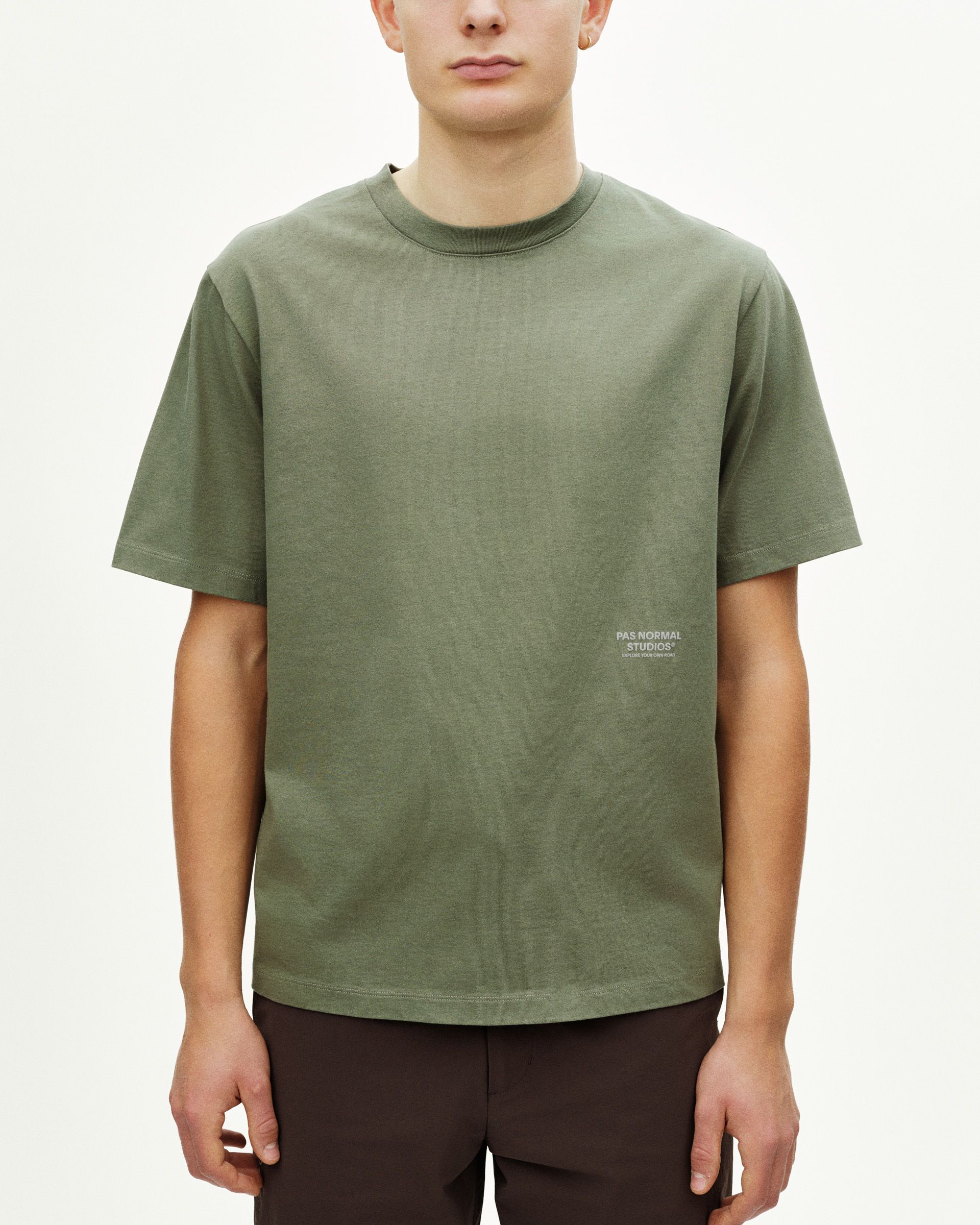 Green Off-Race t-shirt on model, front view with white side logo