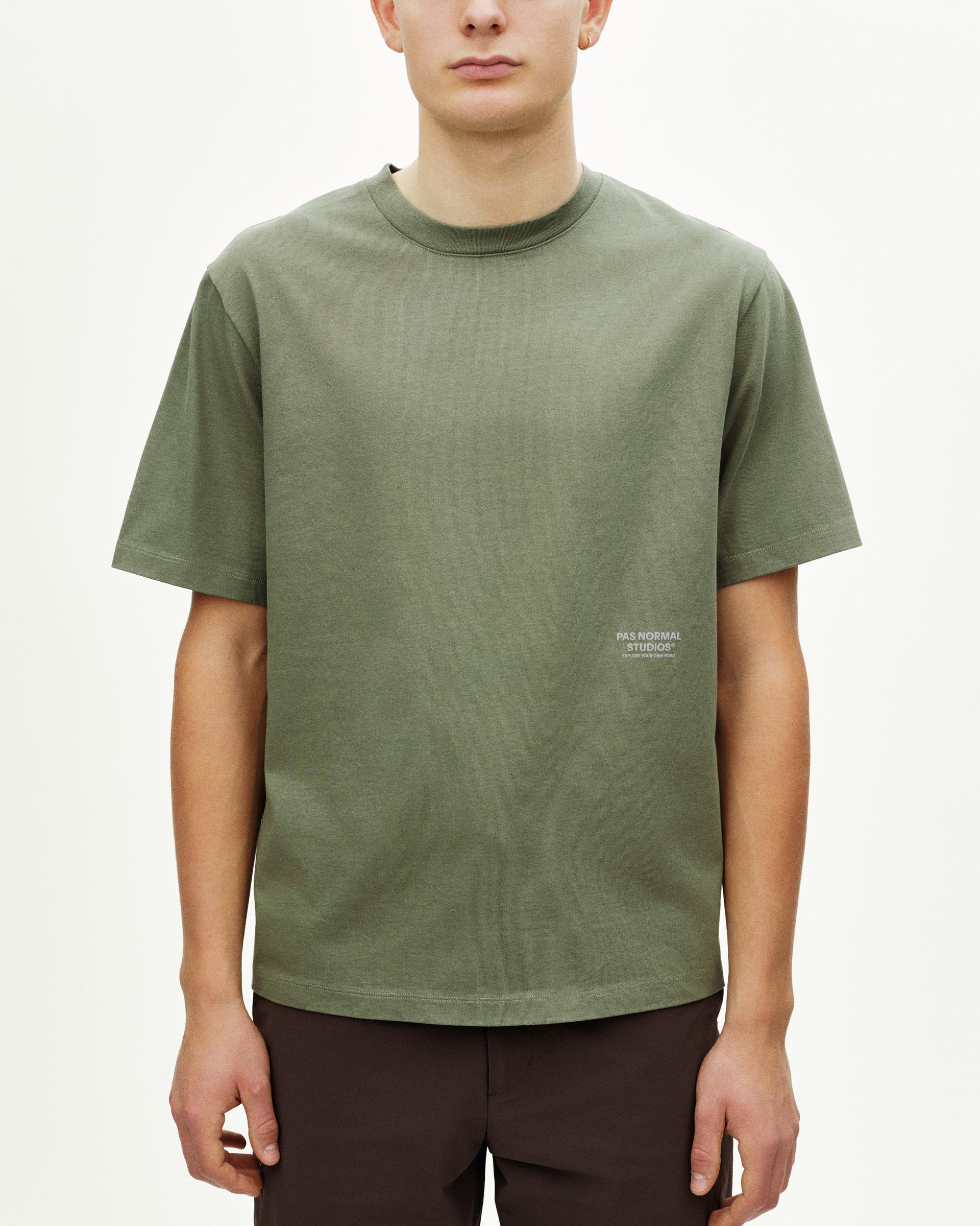 Green Off-Race t-shirt on model, front view with white side logo