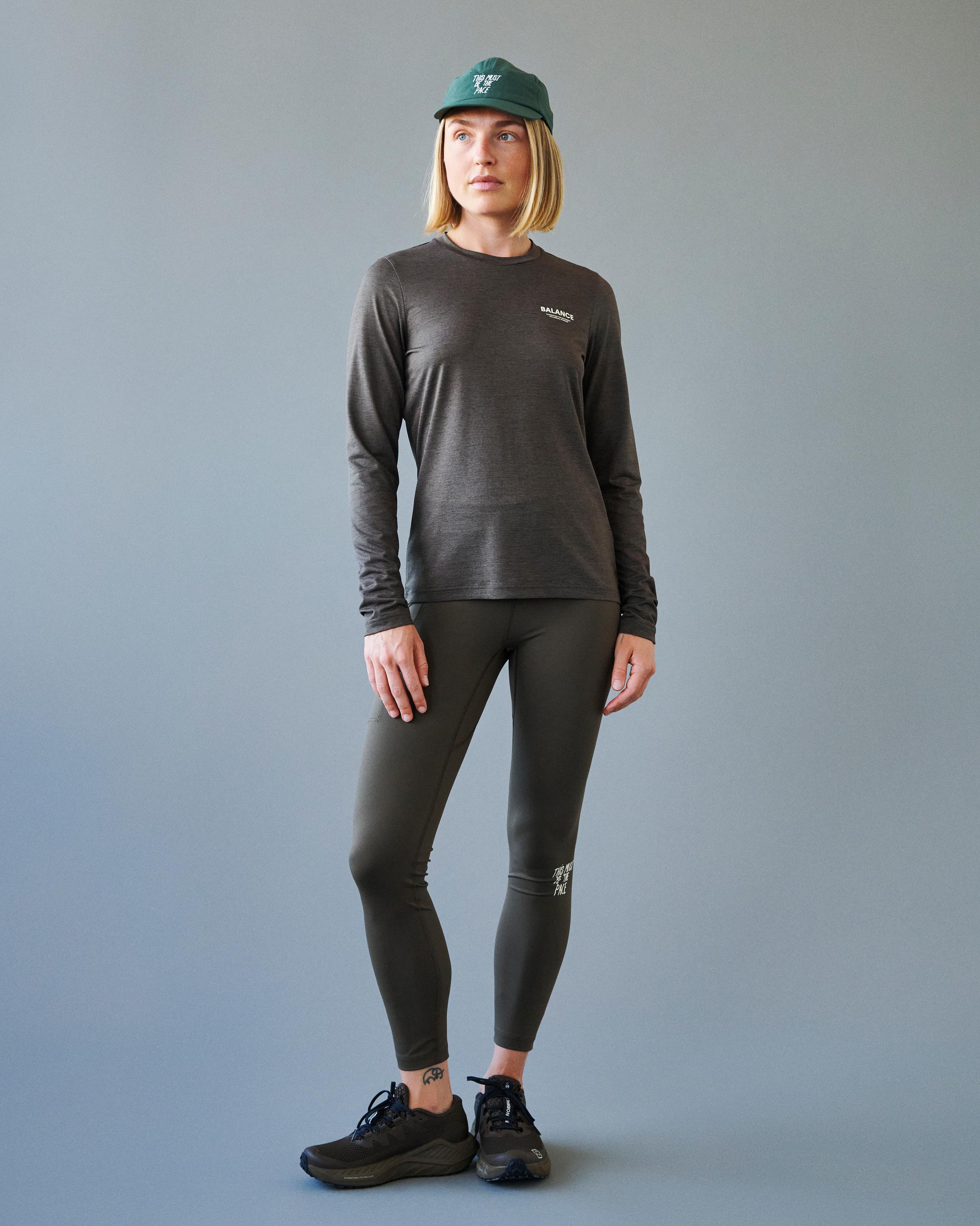 Brown Balance Long Tights on model wearing grey long sleeve top with white chest logo