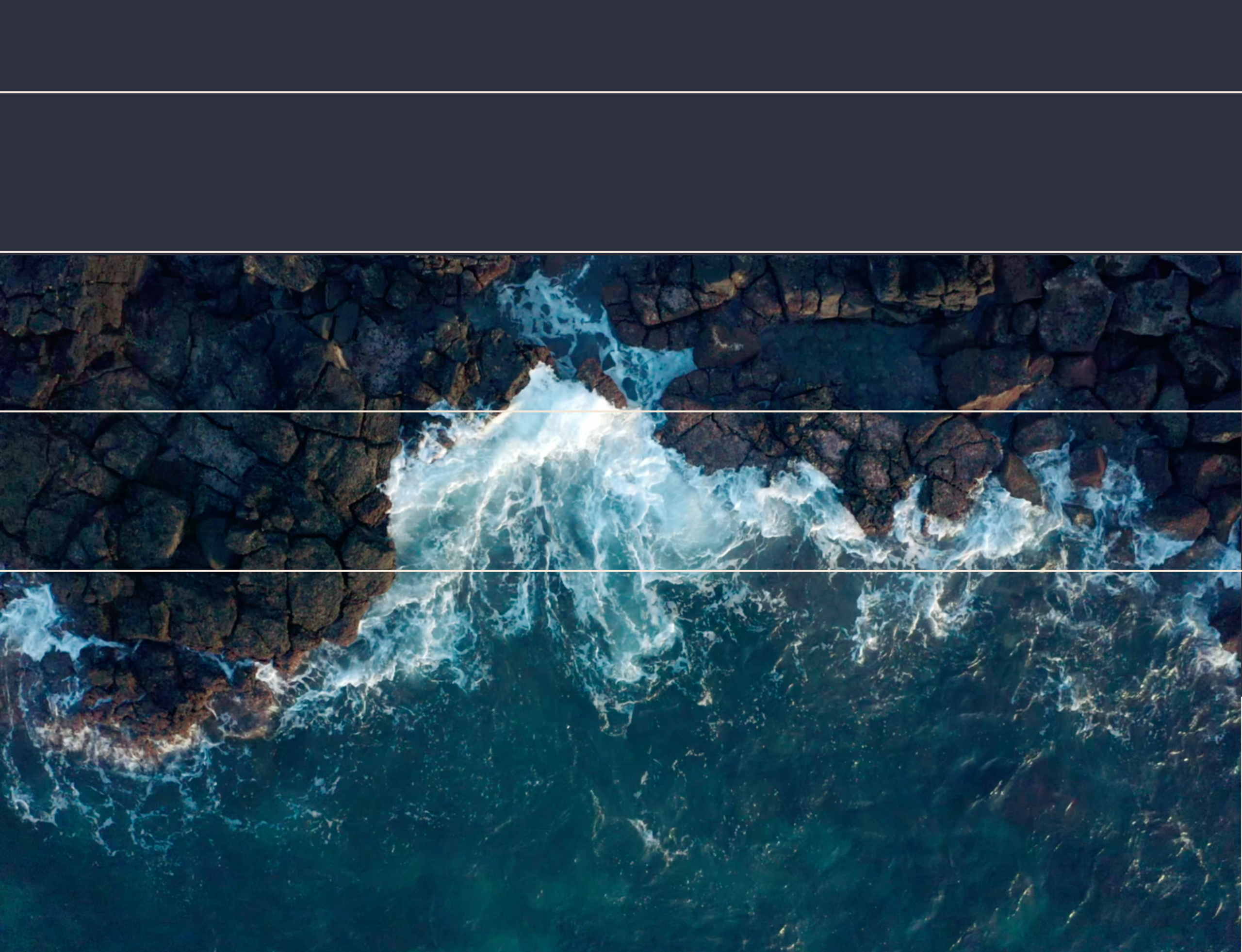 Aerial view of ocean waves crashing against rocky coastline