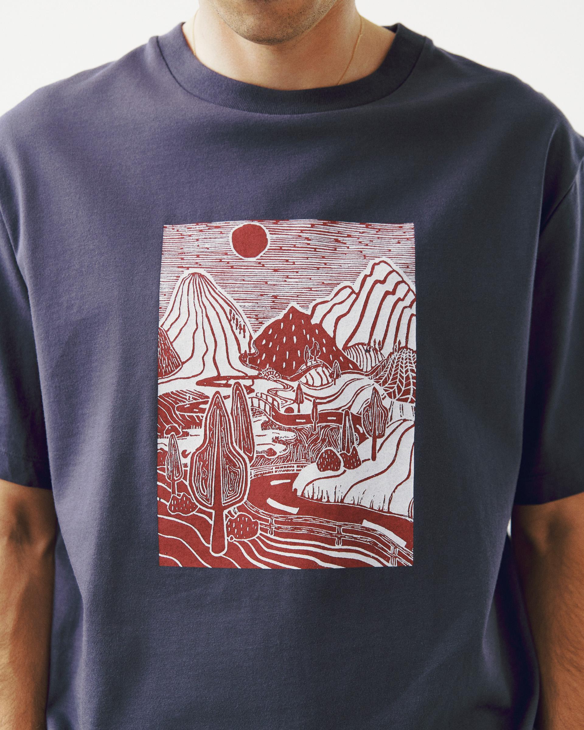 Steel Off-Race Graphic t-shirt on model with red mountain landscape chest print