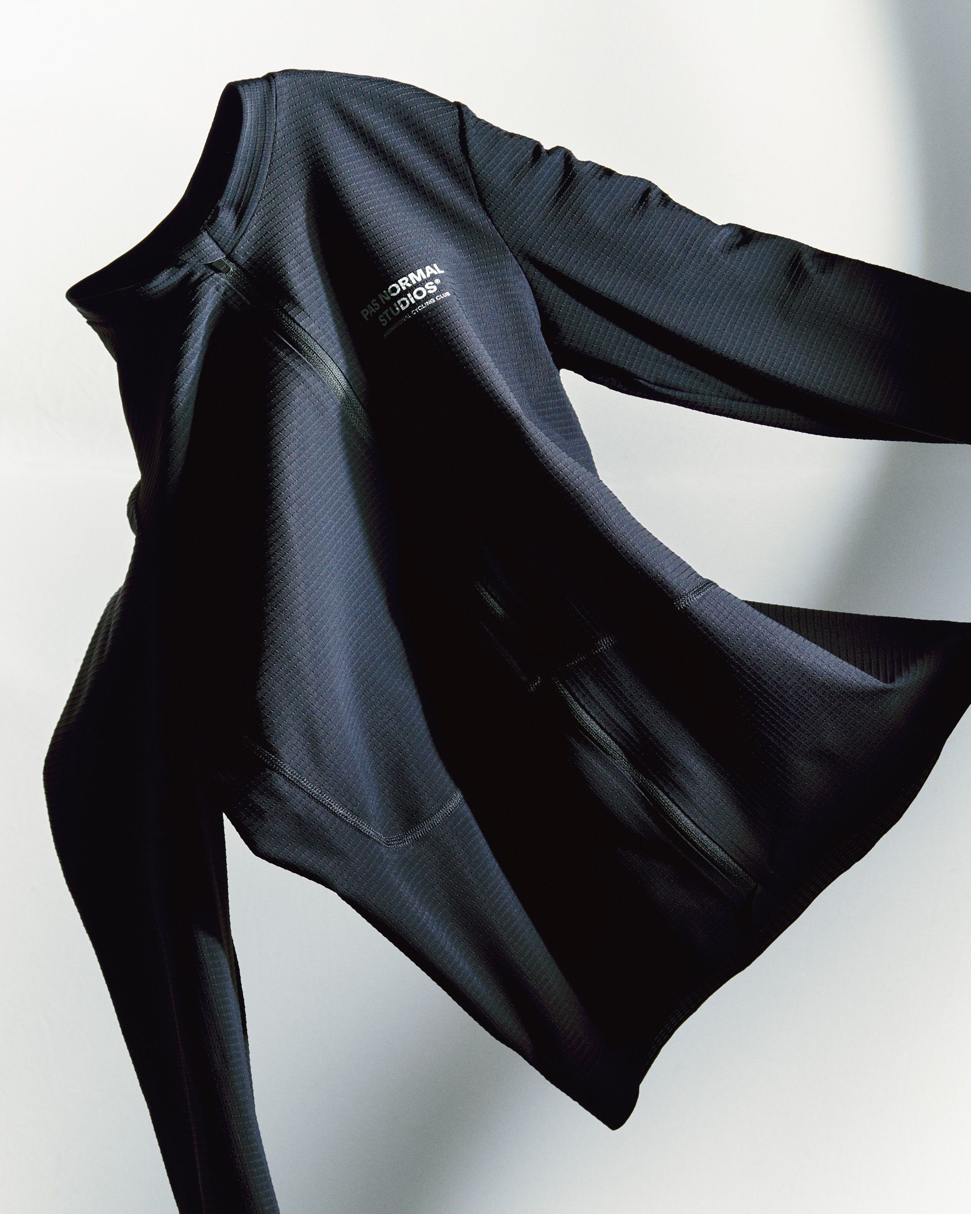 Mechanism Pro base layer in dark grey merino wool with chest lettering
