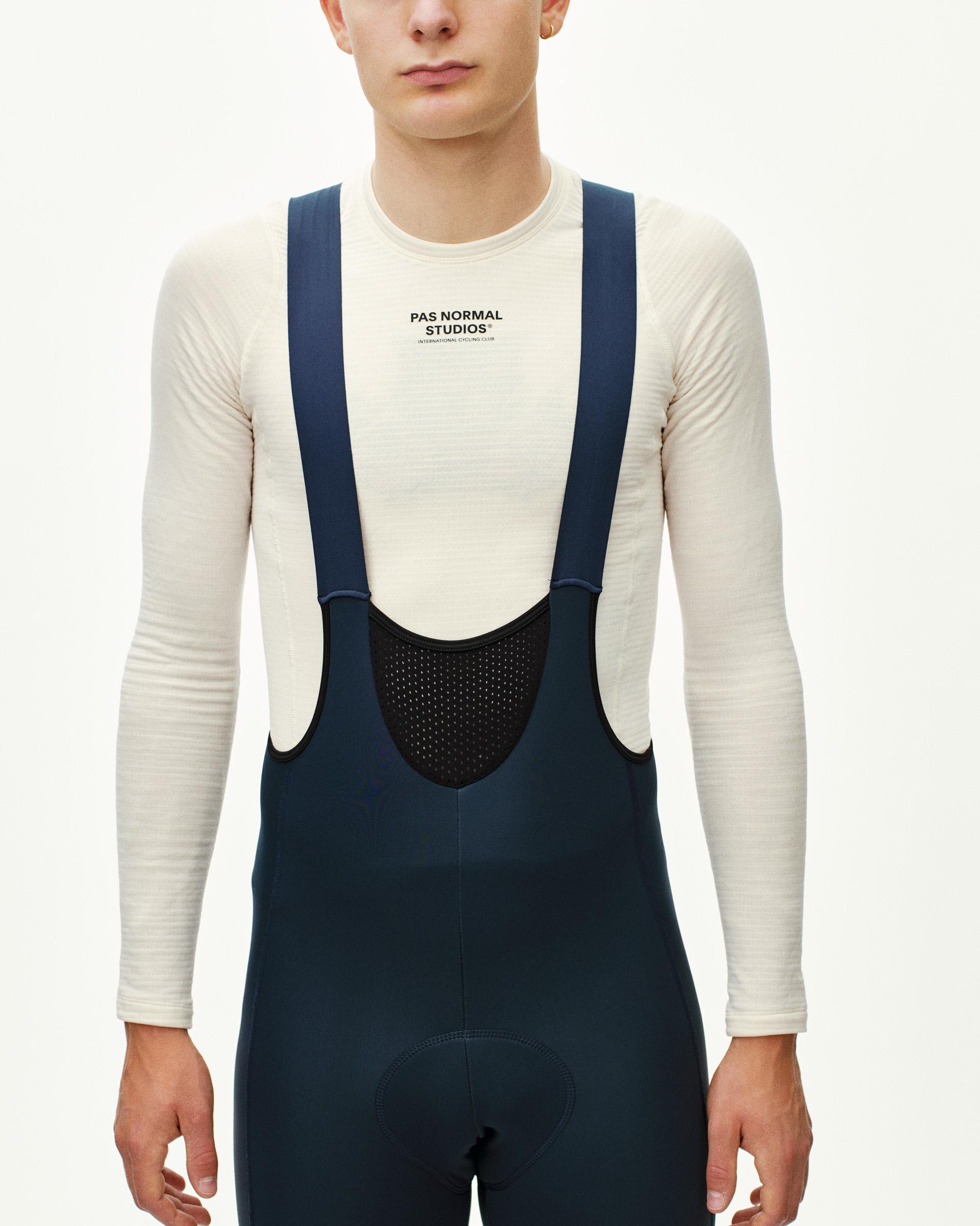 Navy Mechanism Deep Winter Long bibs on model, front view with mesh bib panel