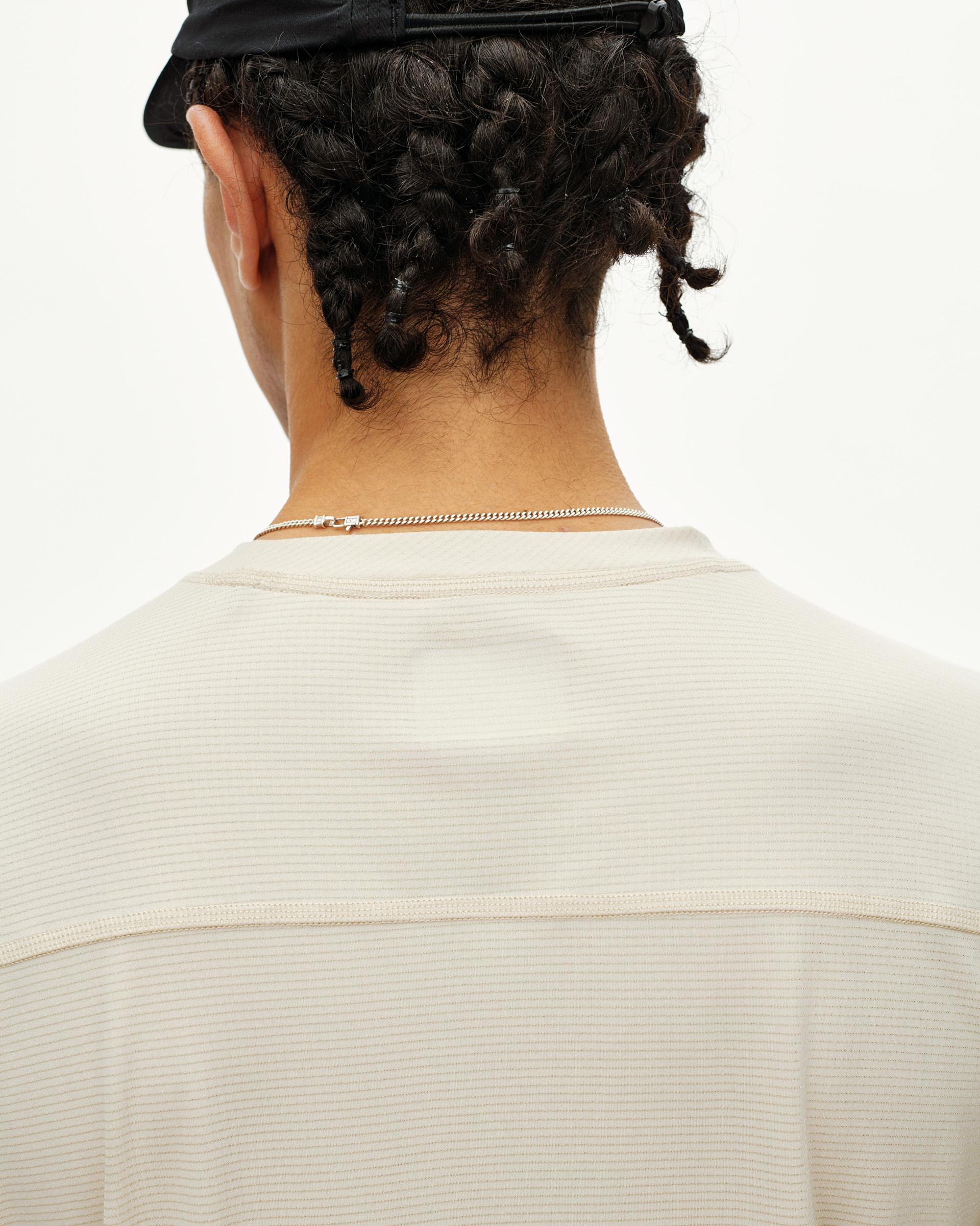 Sand Balance long sleeve T-shirt, rear detail on model with ribbed texture panel