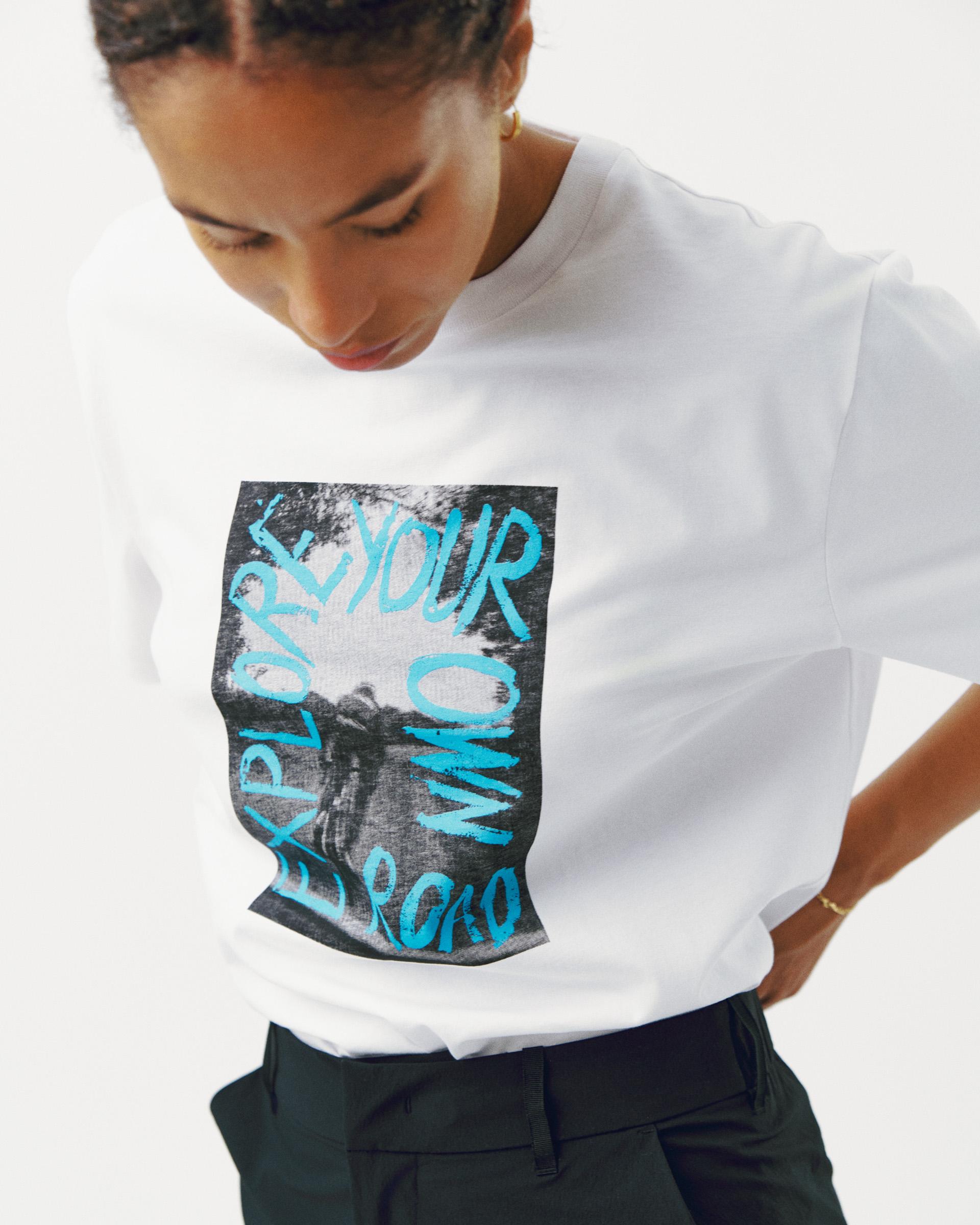 White Off-Race Graphic t-shirt on model with blue graphic print