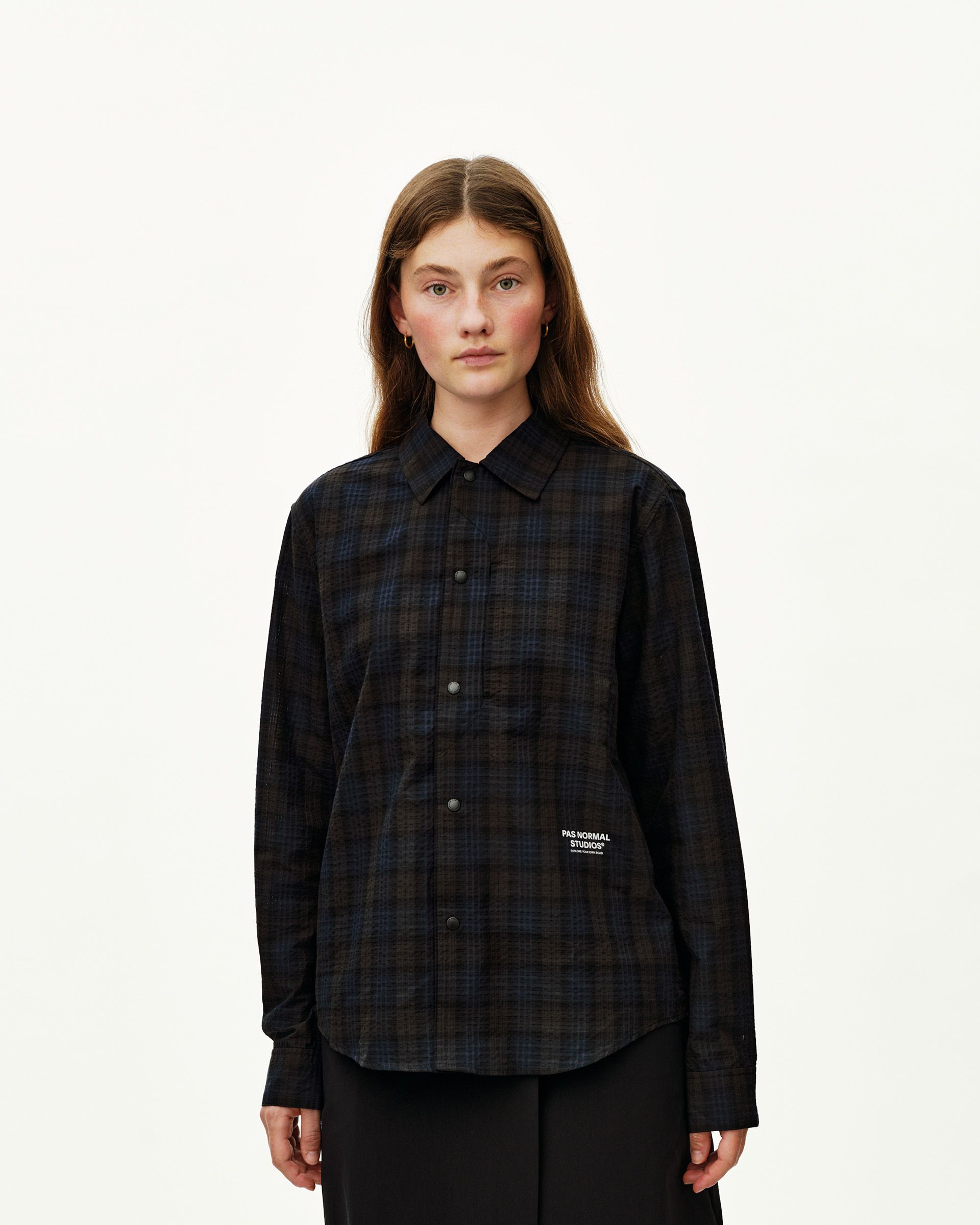 Dark Navy Off-Race Seersucker shirt on model, front view with snap buttons and plaid pattern