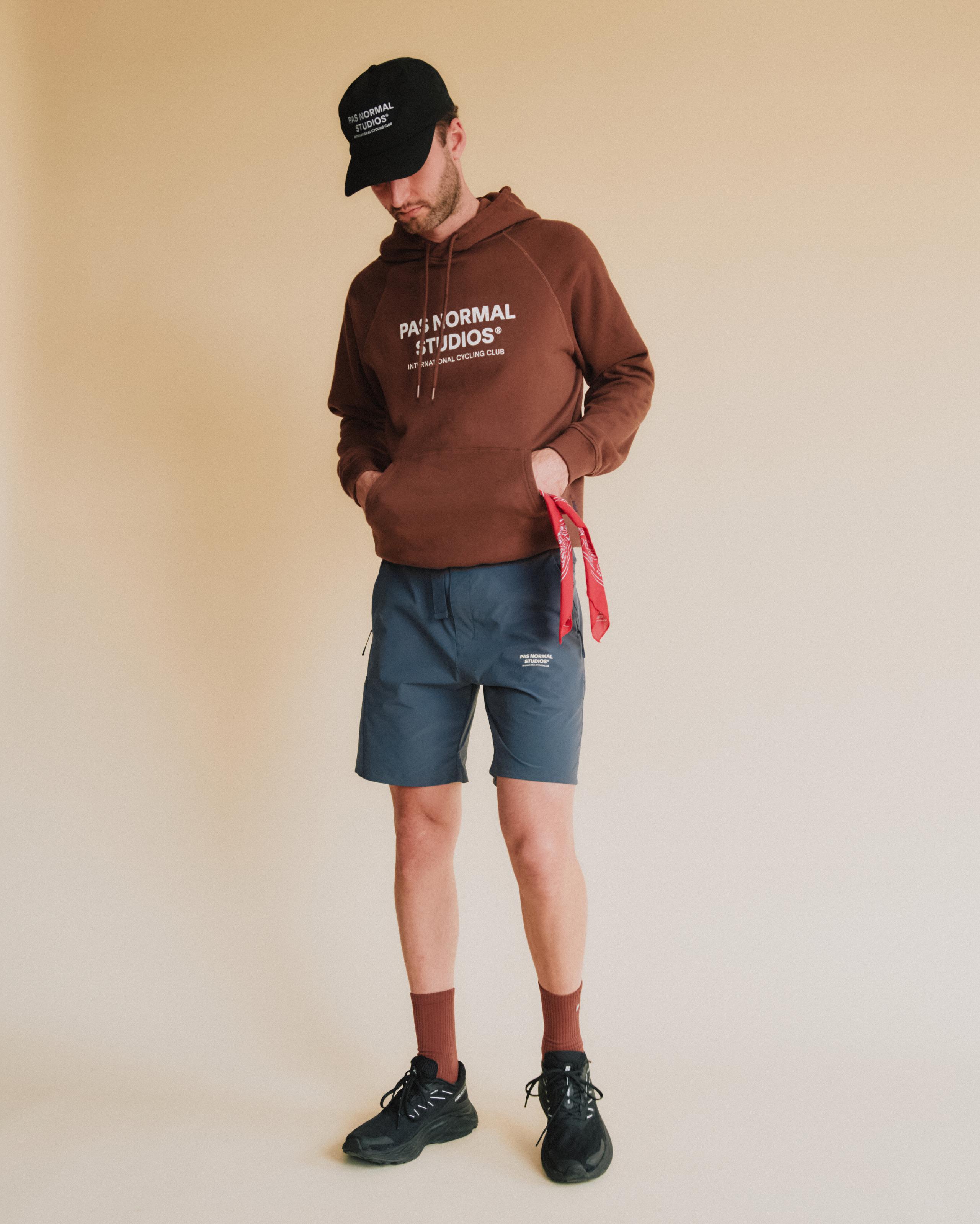 Blue Off-Race shorts on model with elastic waistband and side pockets
