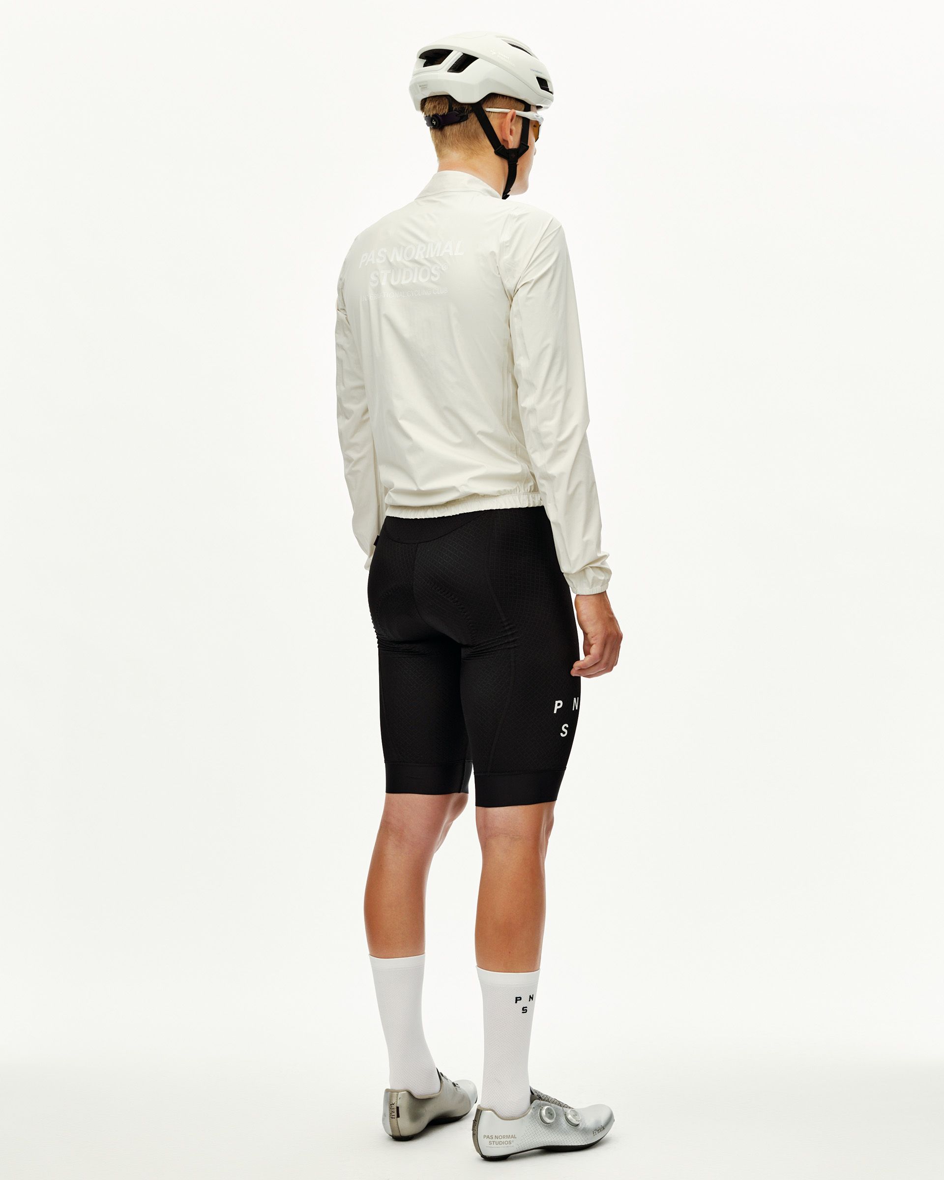 Off White Mechanism cycling rain jacket on model, rear view with tonal back logo print