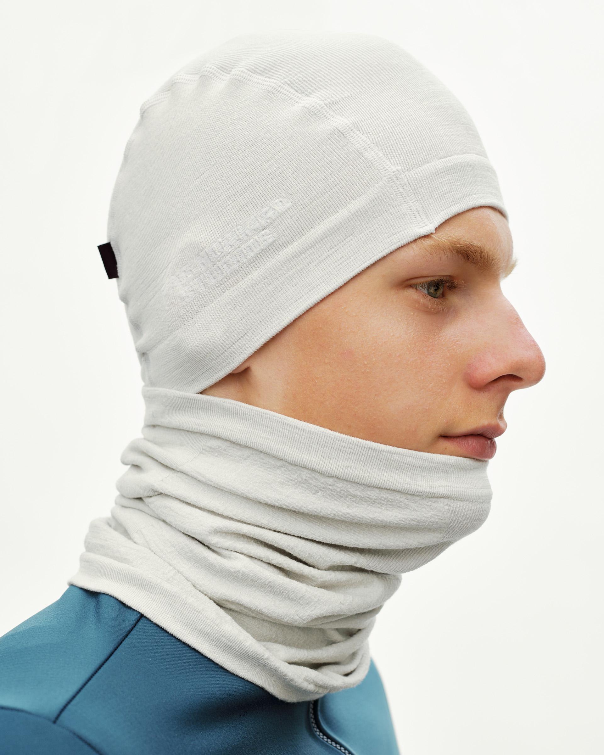 Misty Grey cycling Merino Knit beanie on model, side view worn as balaclava with neck gaiter