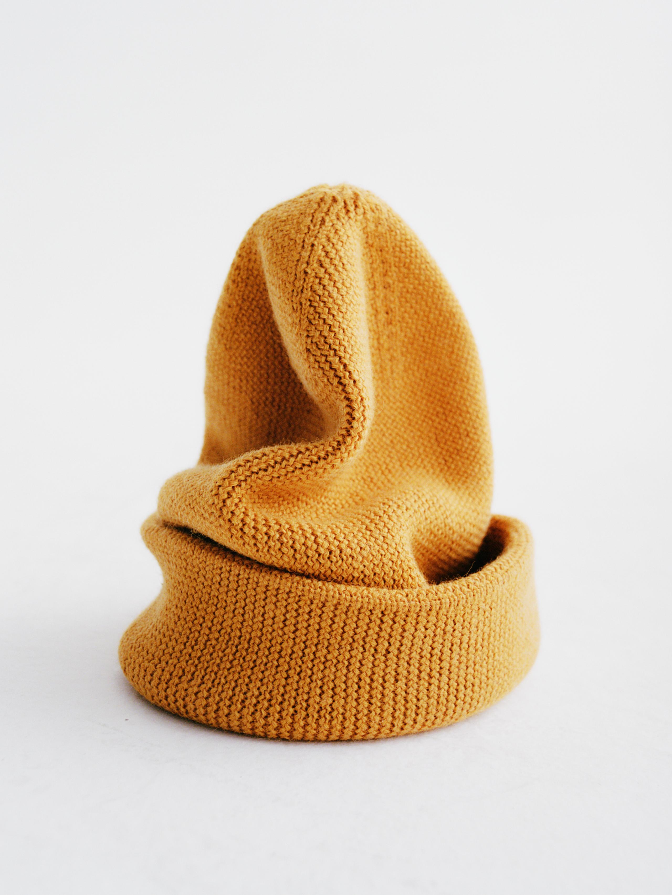 Yellow Off-Race Heavy Knit beanie, side view showing ribbed knit texture and folded brim