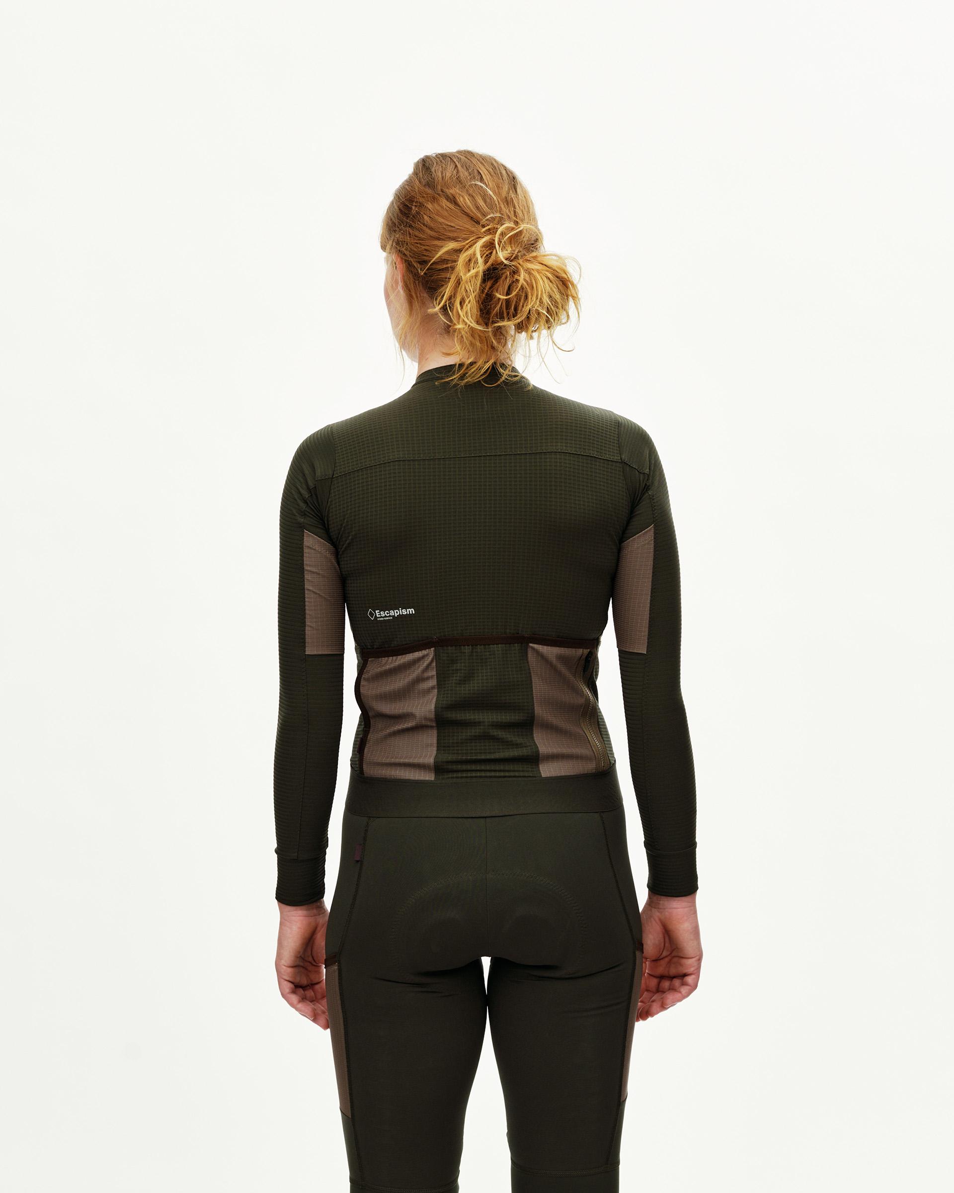 Dark Olive Escapism long sleeve cycling jersey on model, rear view with contrast back pockets
