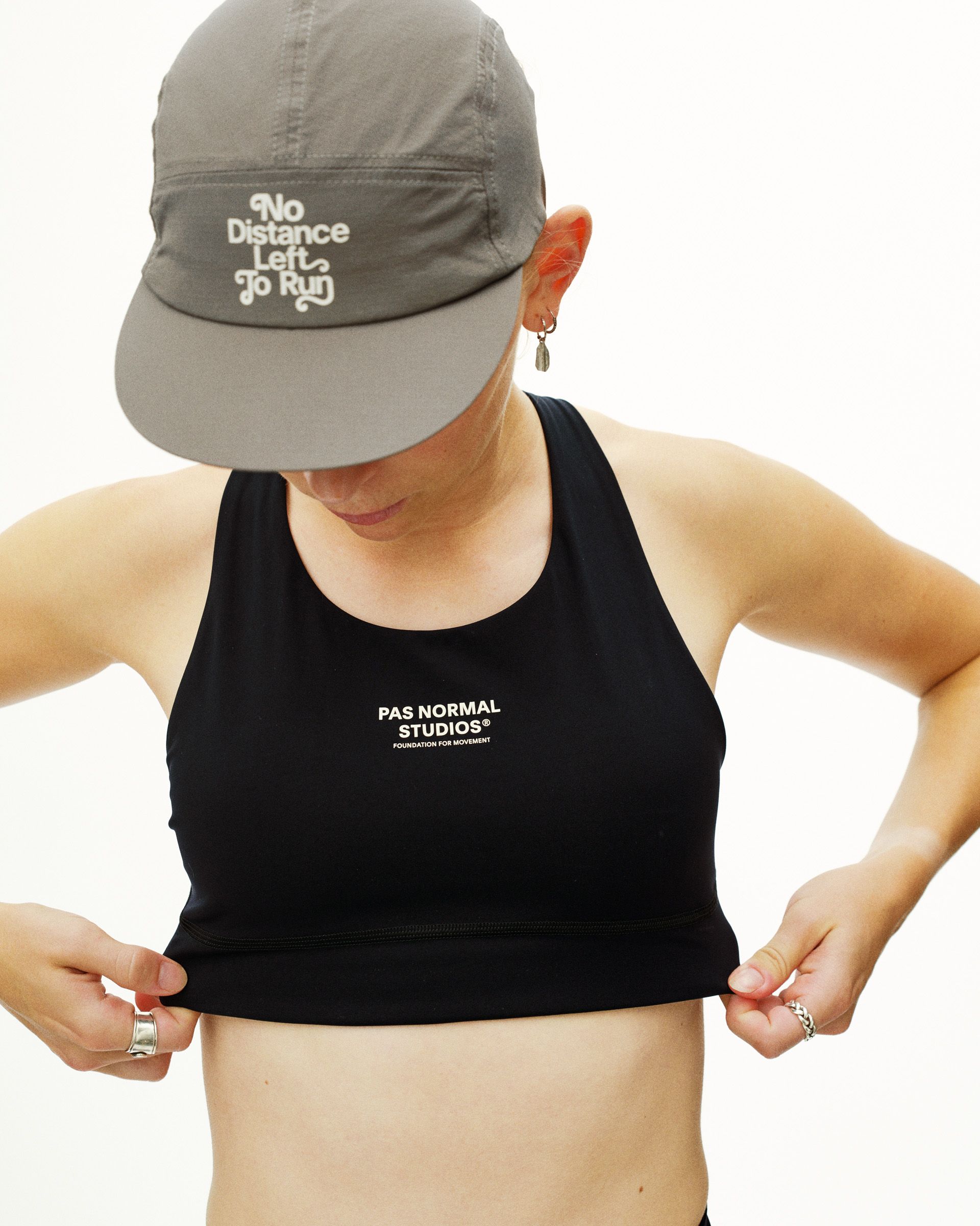 Medium Grey Balance cap on model, front view with embroidered slogan panel