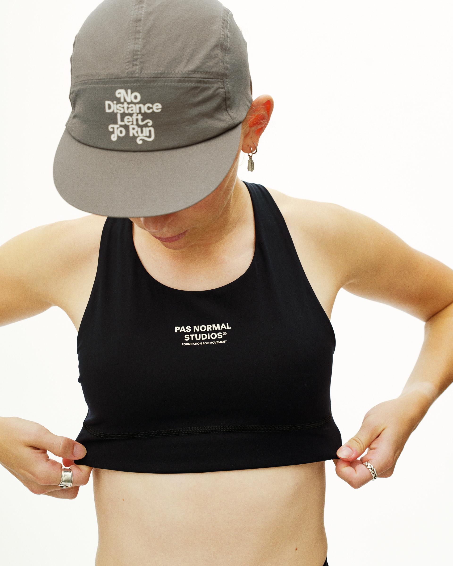 Medium Grey Balance cap on model, front view with embroidered slogan panel